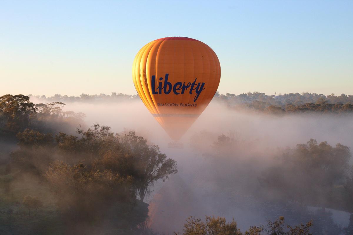 Floating over Yarra Valley mist in a hot air balloon