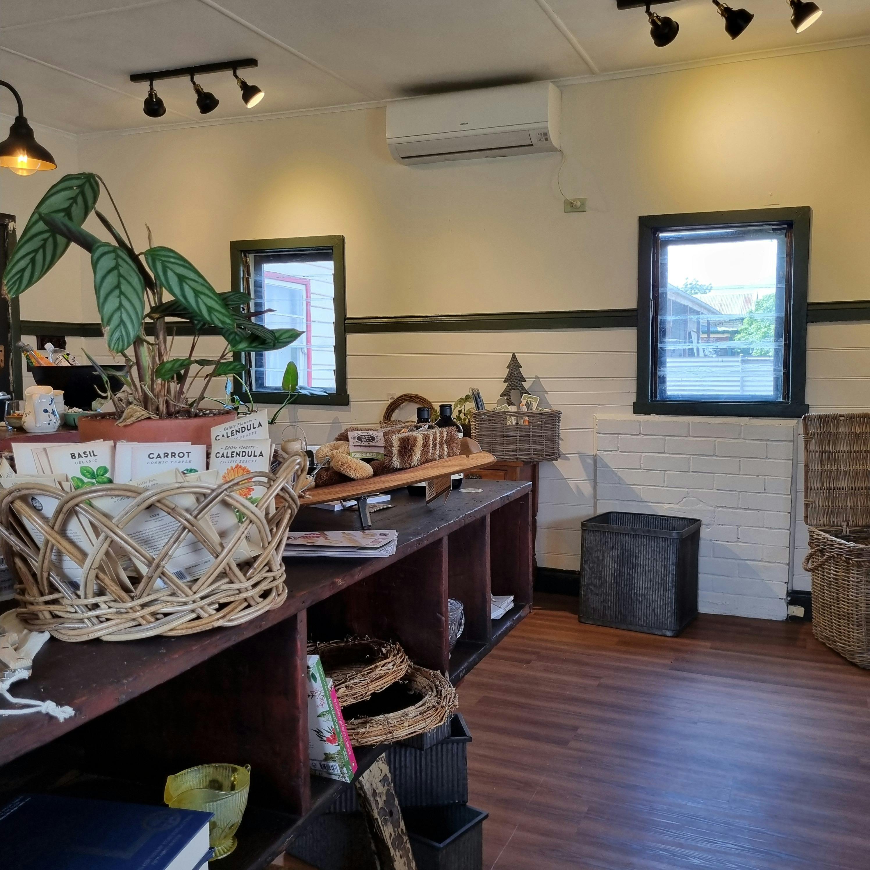 Kitchen Garden Mercantile - shop interior  showing louvre sindows and bench