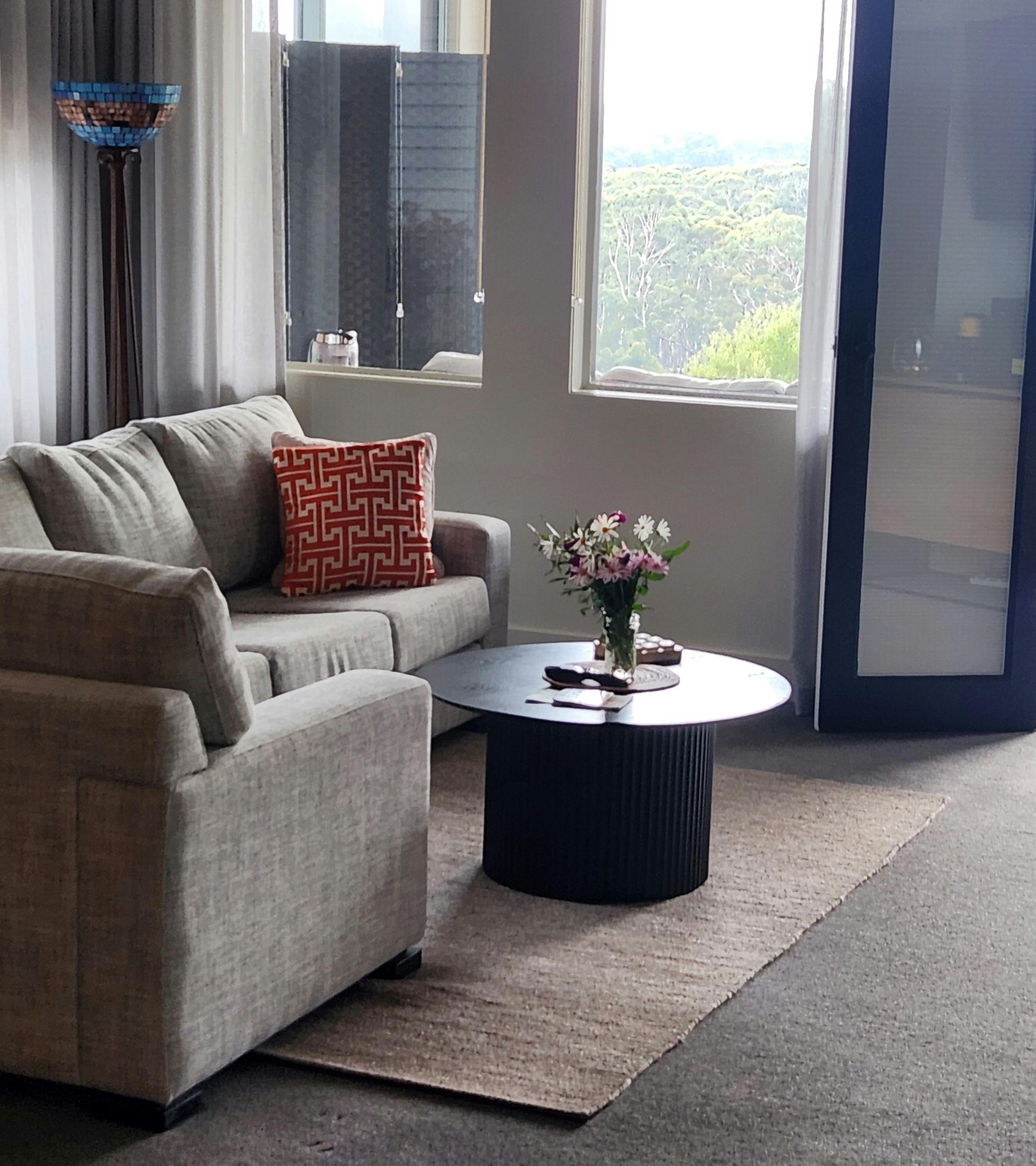 Soft textures, warm tones, and thoughtful touches create a space where  luxury meets relaxation