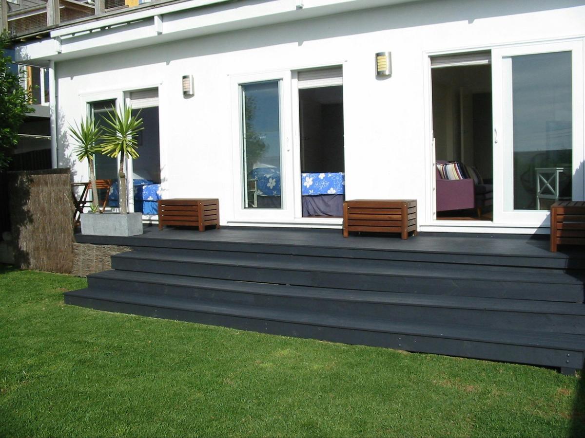 Lounge and bedrooms open to private yard