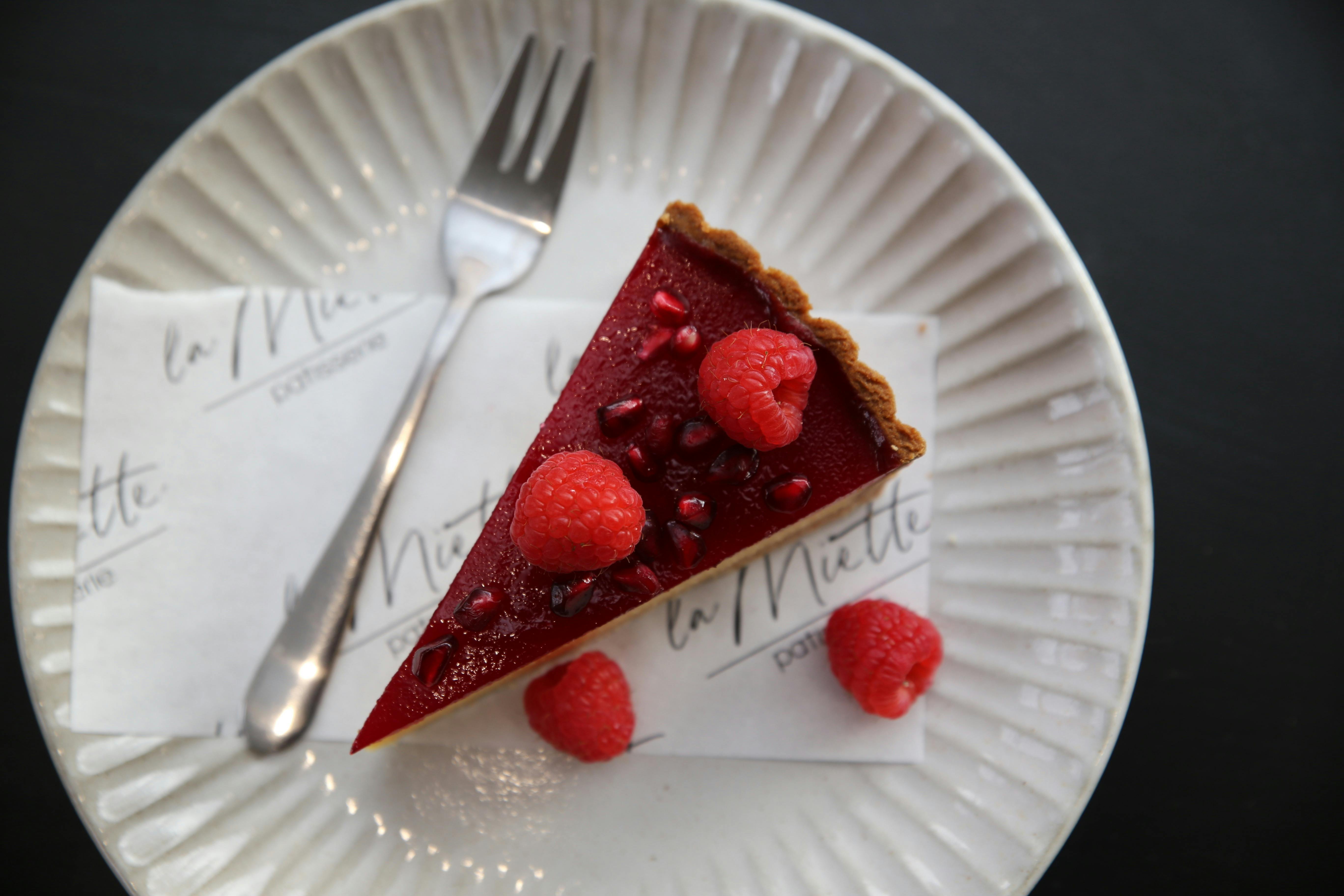 Seasonal pomegranate cream cheese custard tart slice