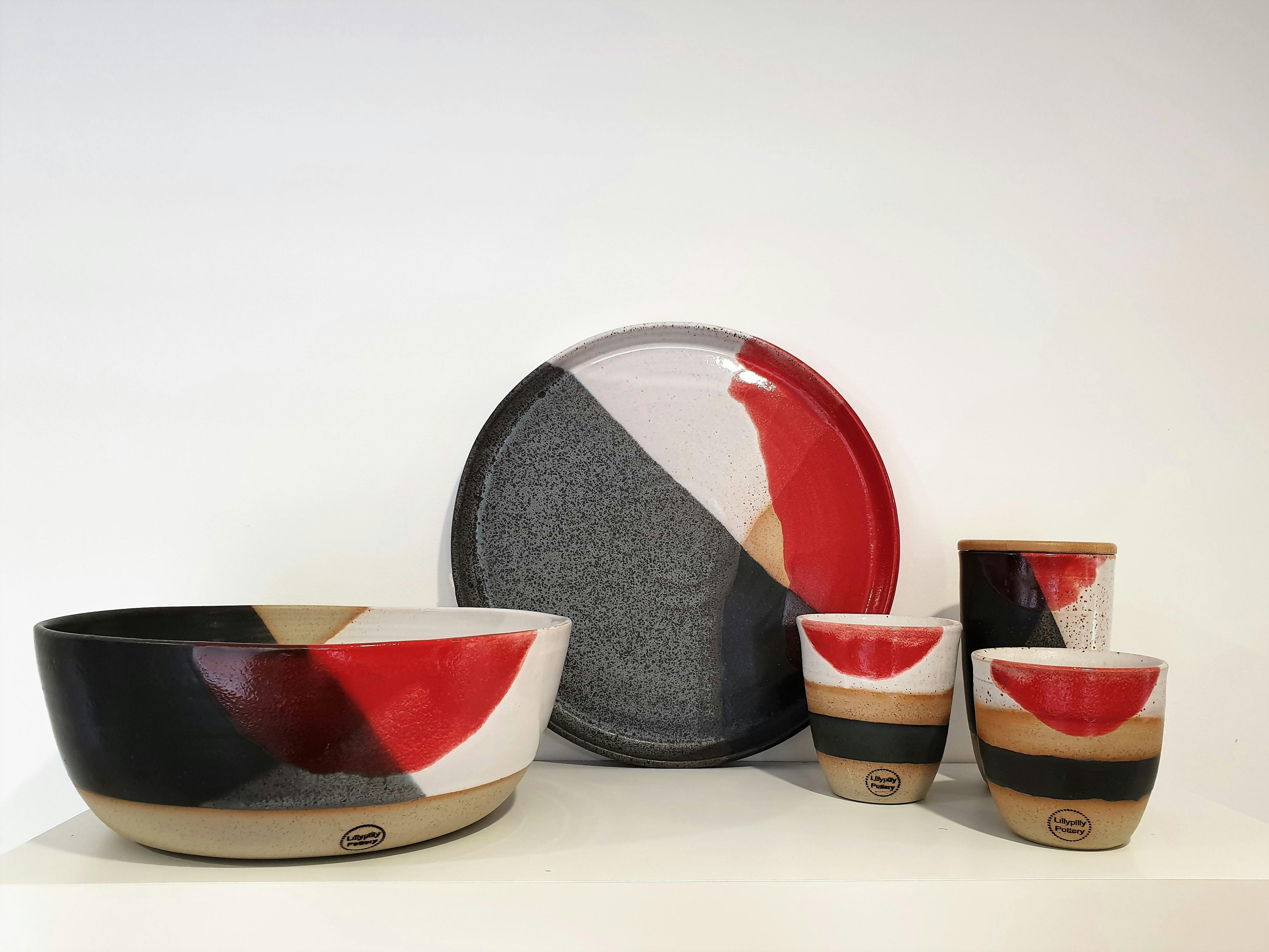 For the adventurous decorator add a bit of bright red to cheer up any room or dinner table setting