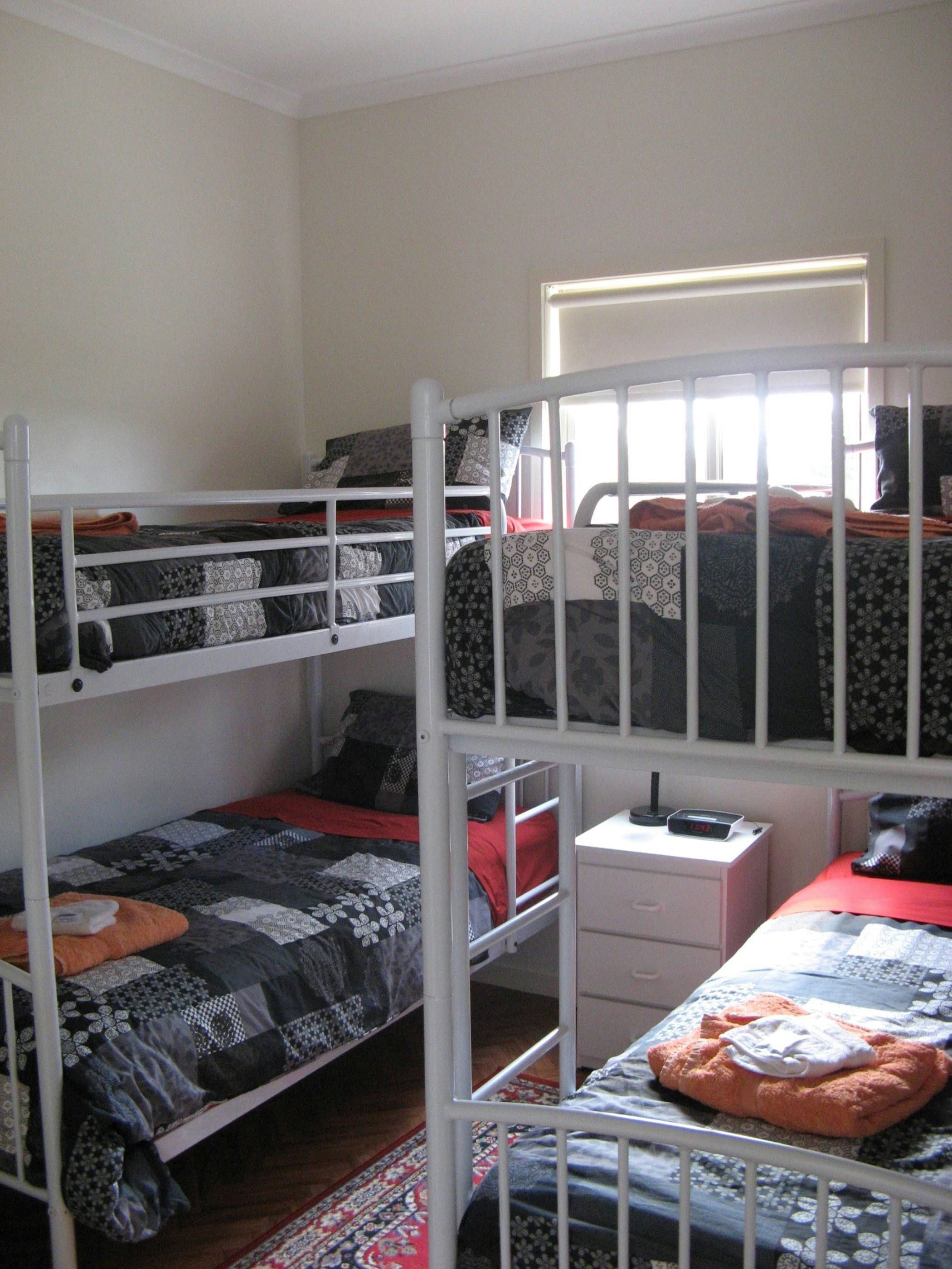 Room with two sets of bunk beds