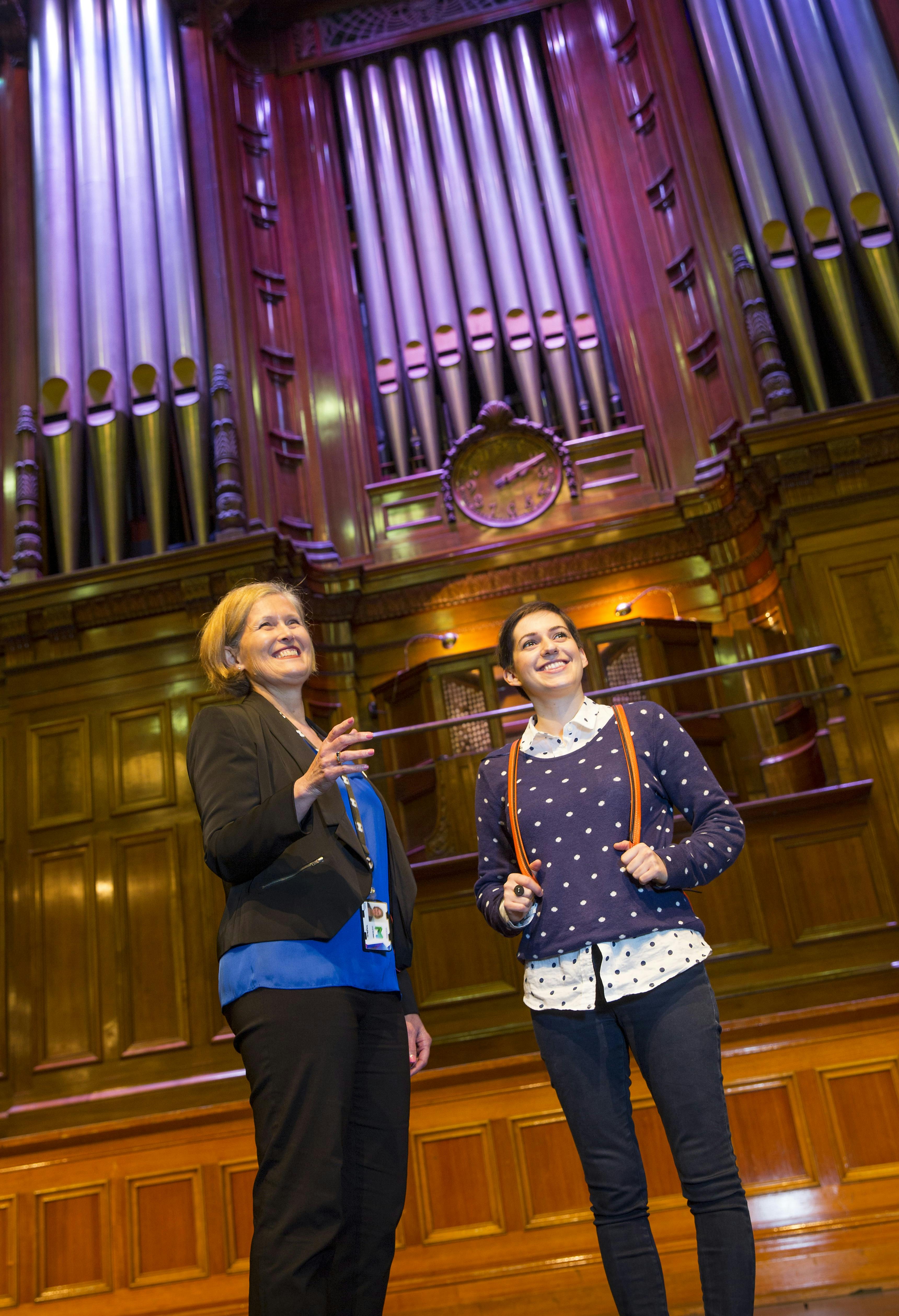 A Town Hall tour guide showing a visitor the magnificent Melbourne Town Hall Organ