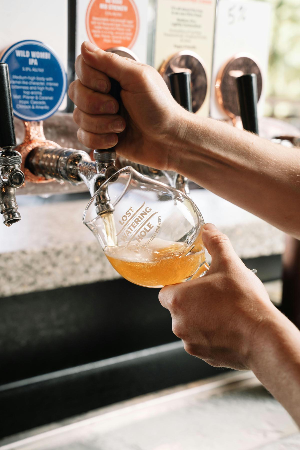 Drink being poured in a glass