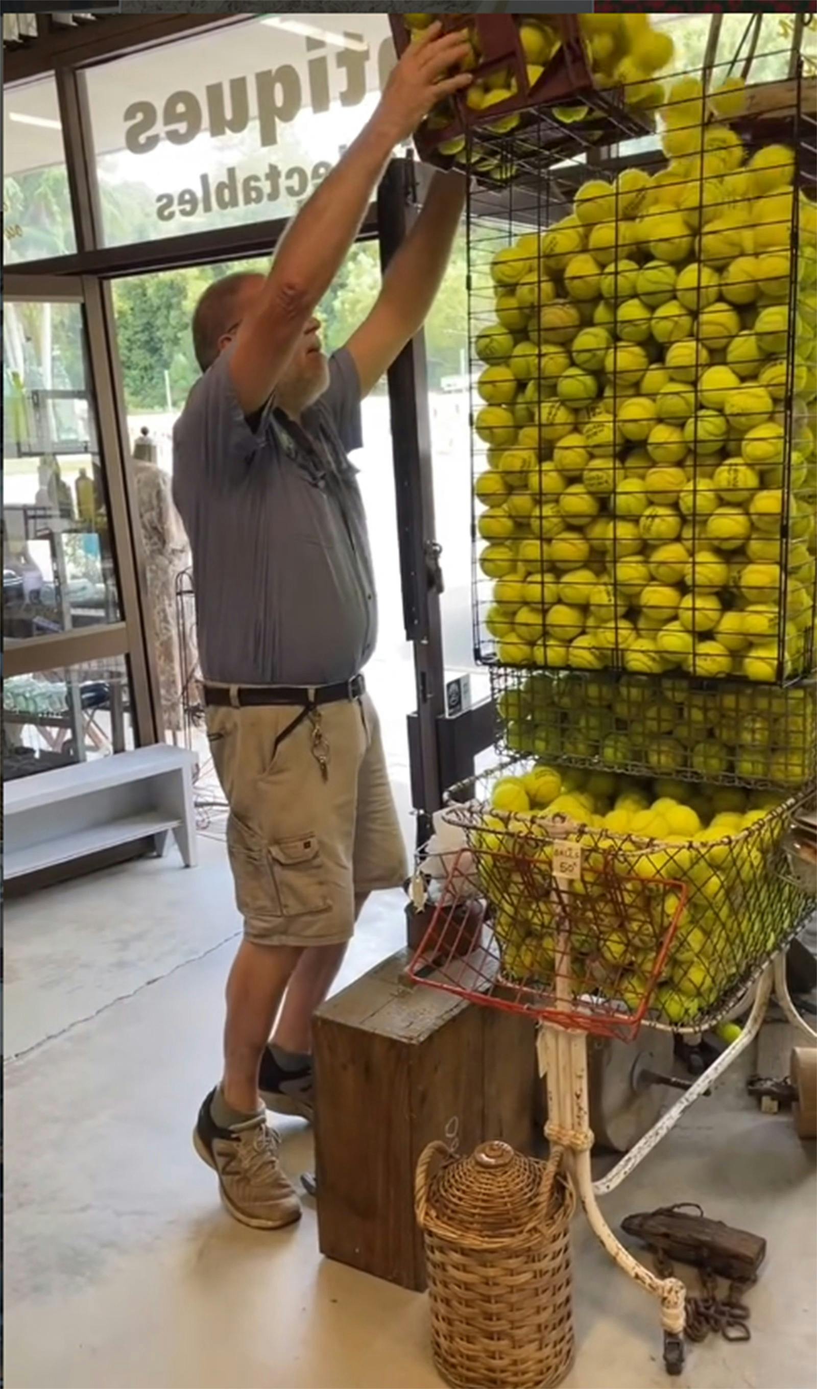 Ross filling the Tennis Ball stand