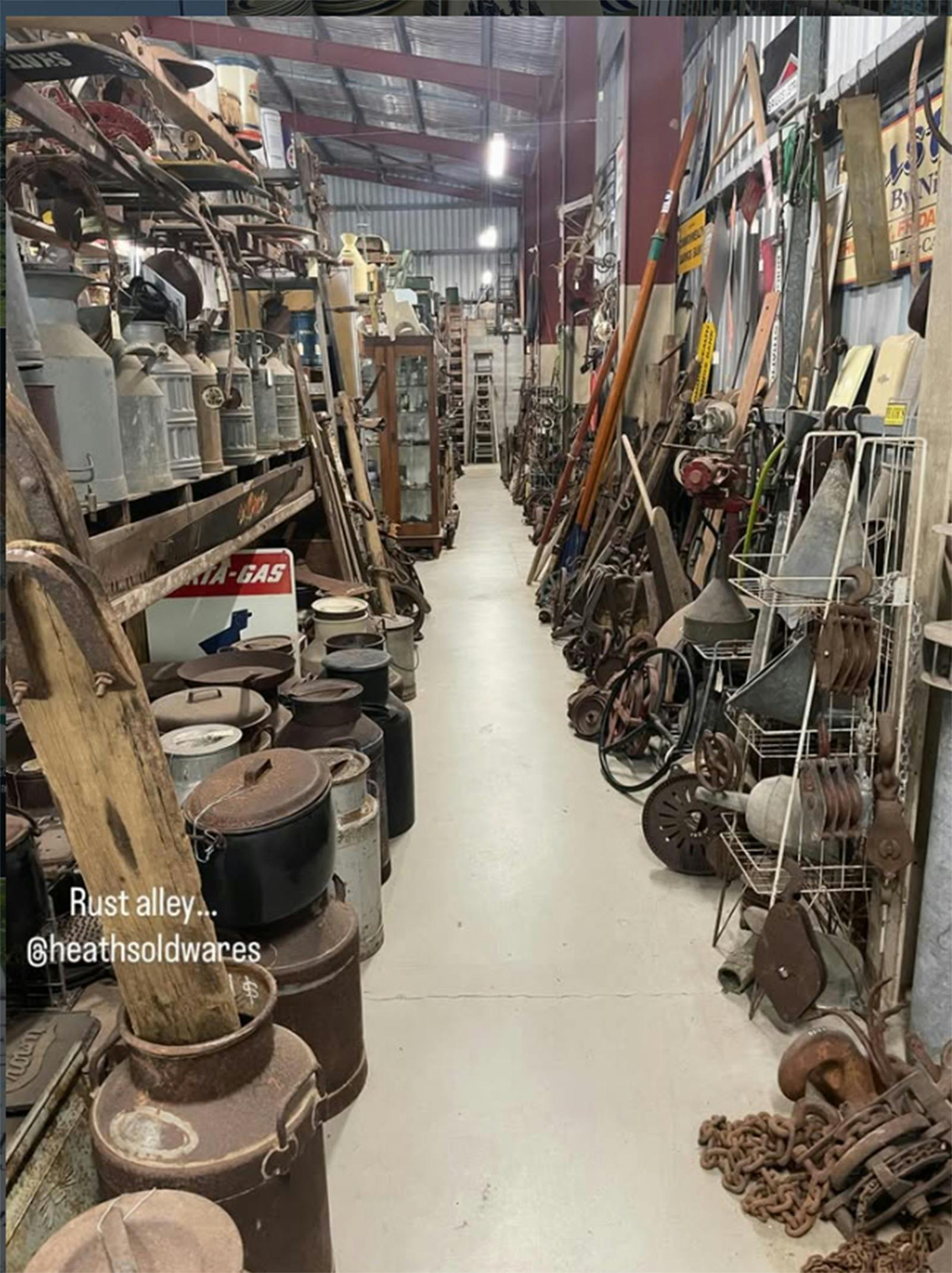 Rust Alley, a mix of industrial antiques, old tools, cream cans, oars, who knows!!