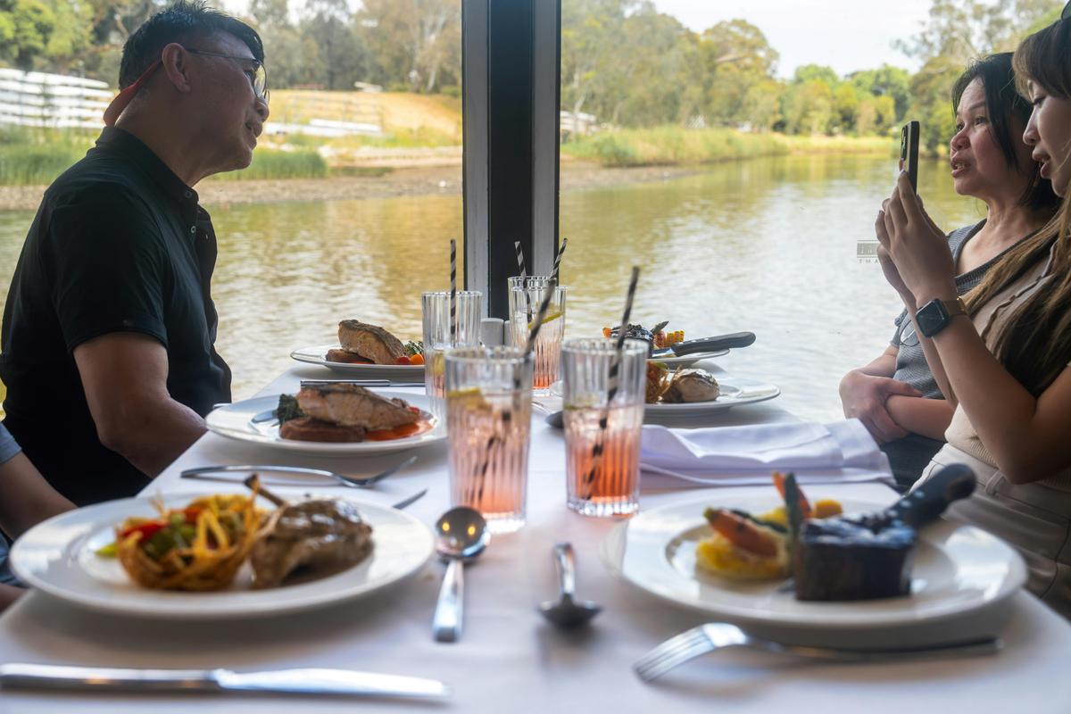 People enjoying the Mother's Day River Cruise
