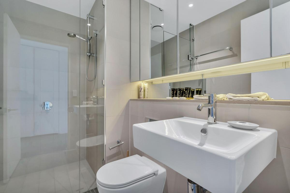 Bathroom with Shower, Vanity and Toilet