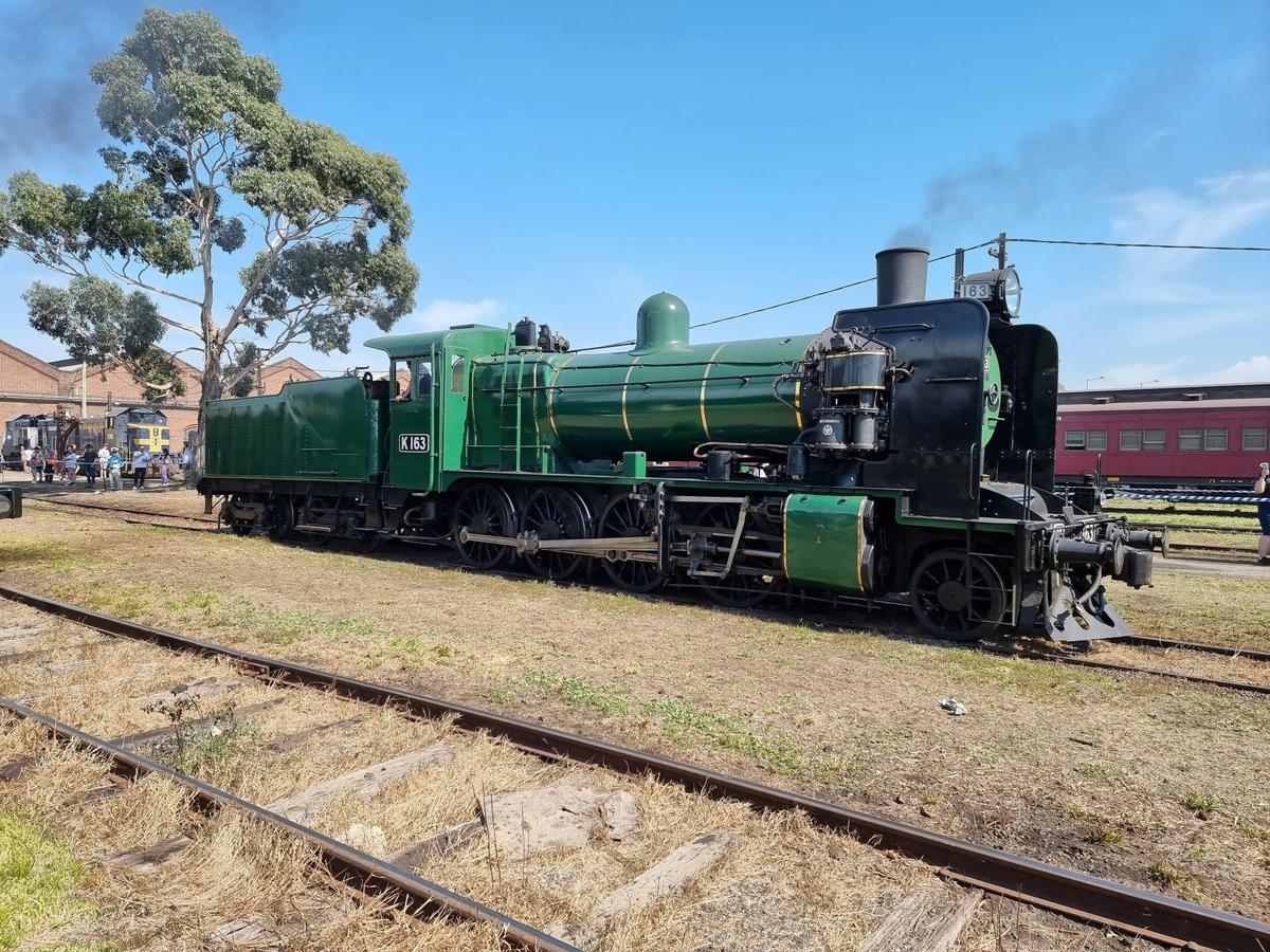 Green and black steam train at Mornington Tourist Railway