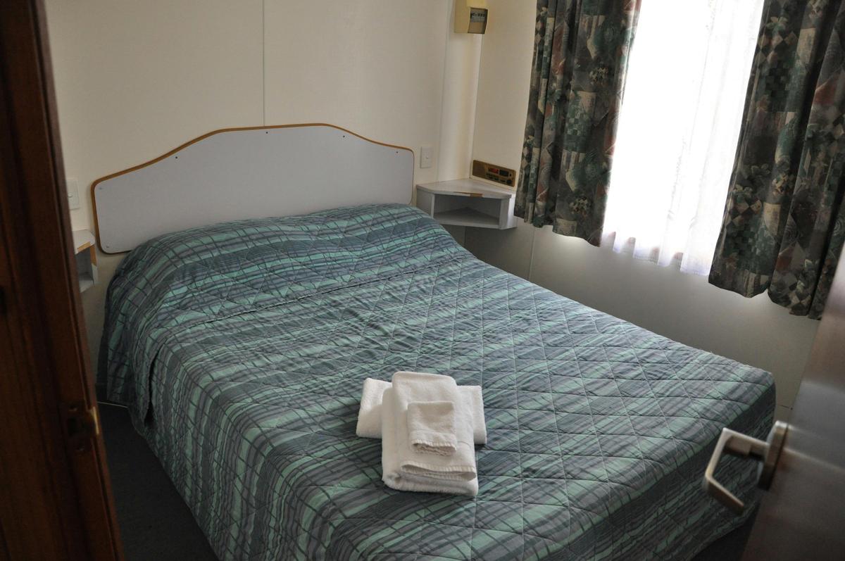 Miner's Retreat Motel Cabin Bedroom