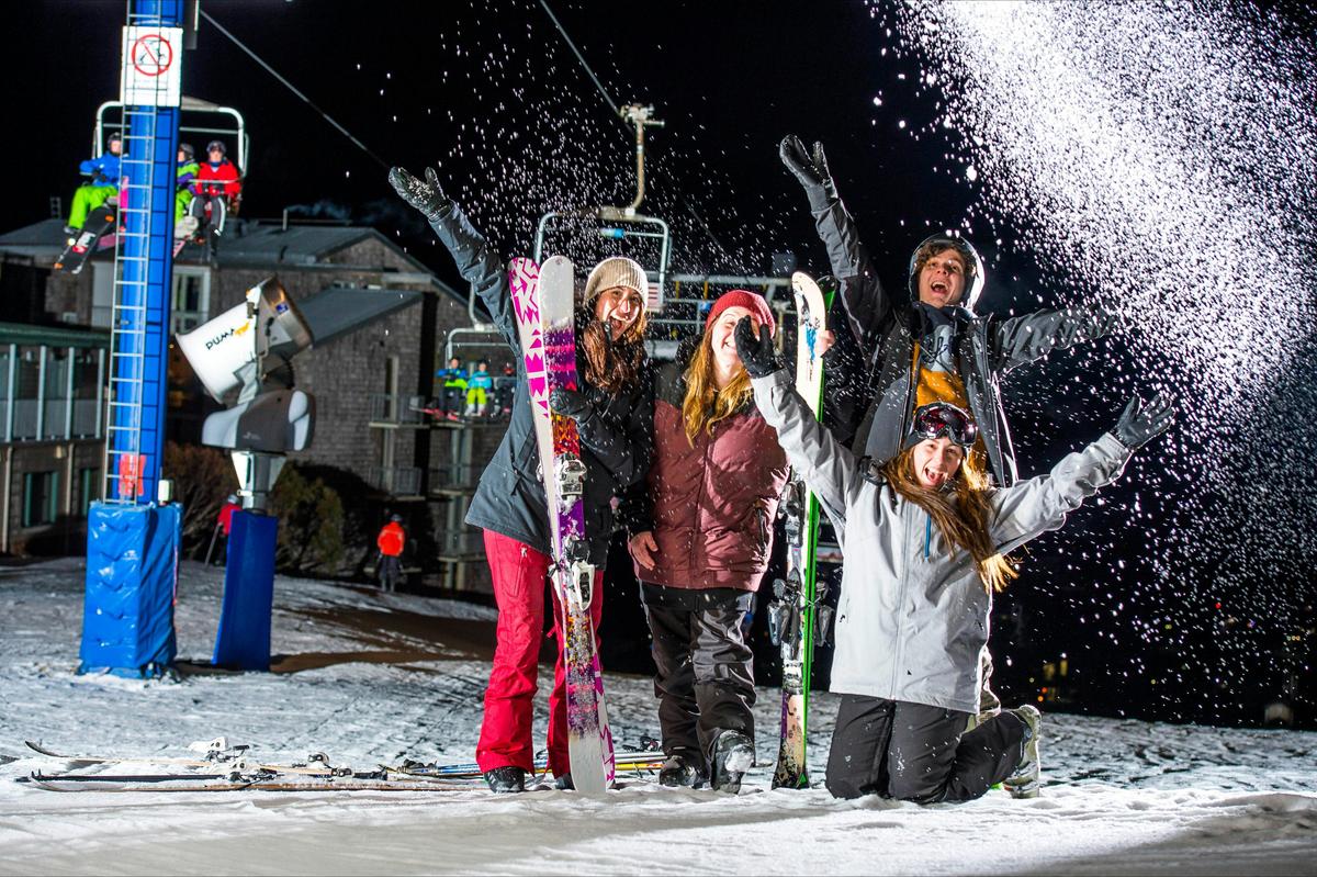Smiling faces during twilight skiing