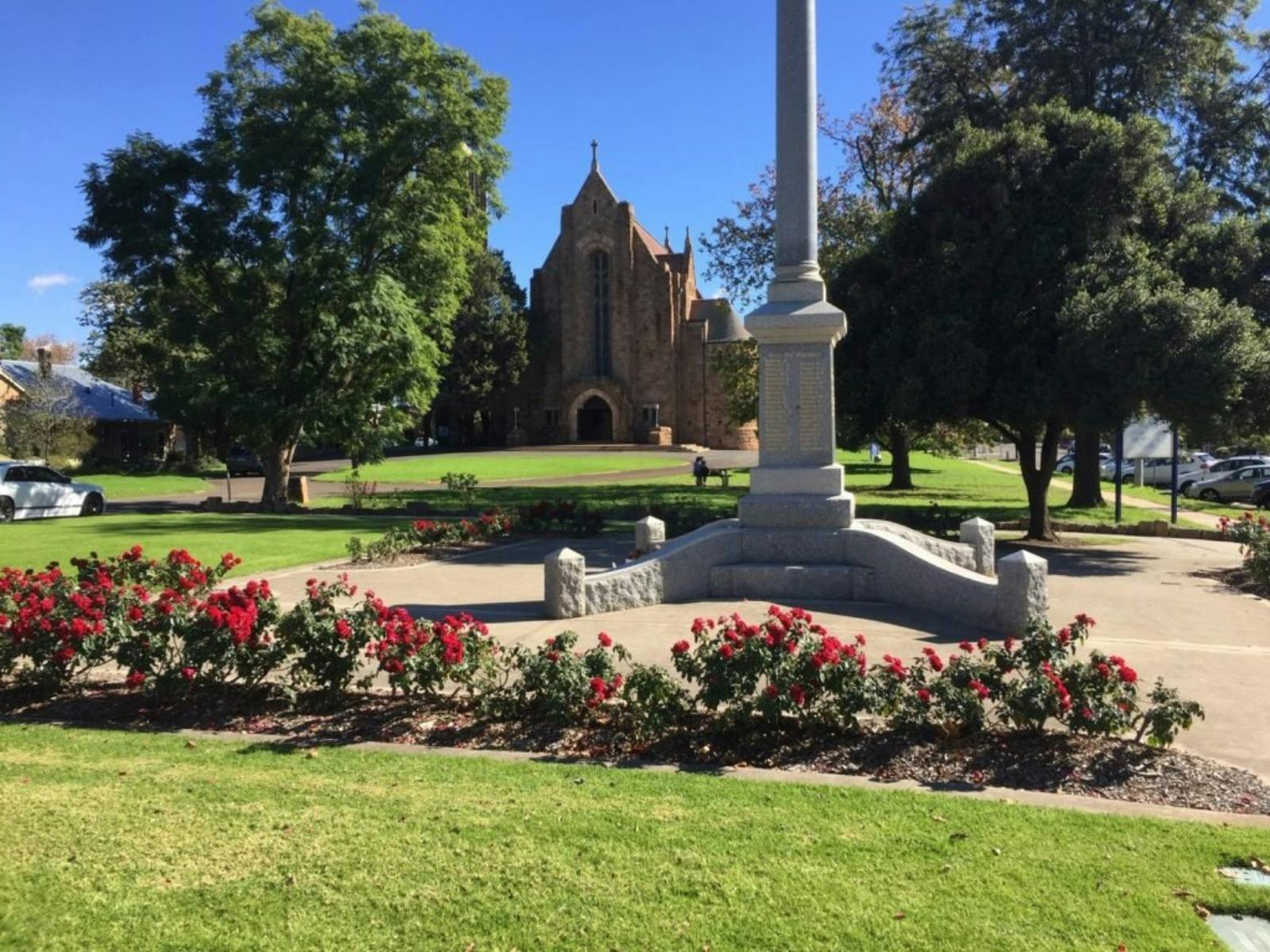Closeup of memorial garden with Holy Trinity Cathedral in background