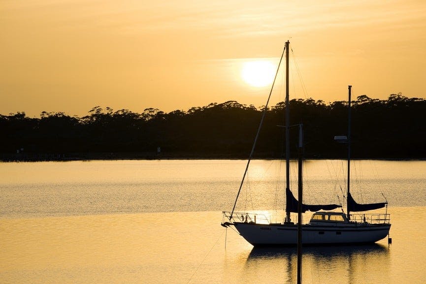 Yacht moored at Metung at sunset