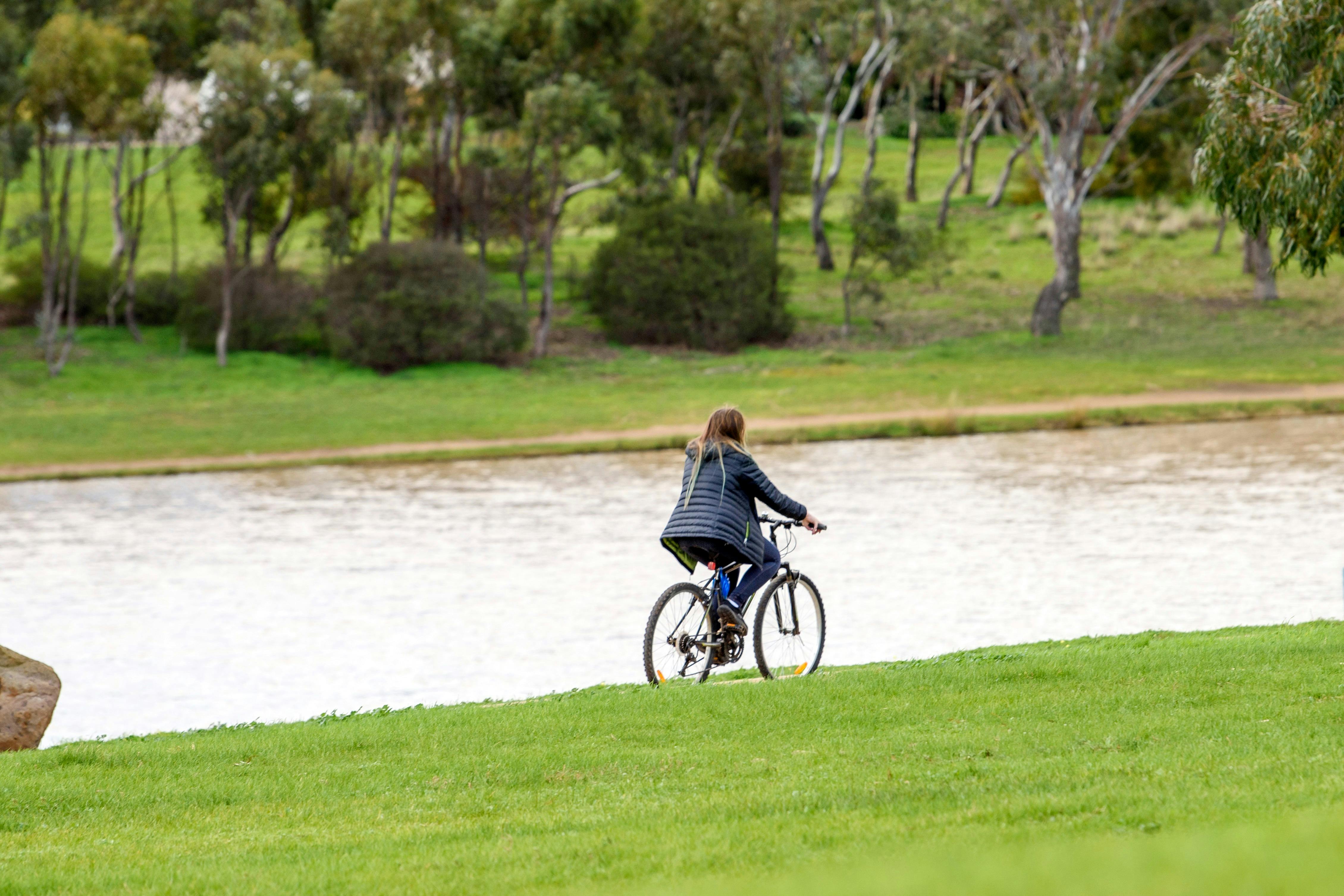 Bike rider around lake
