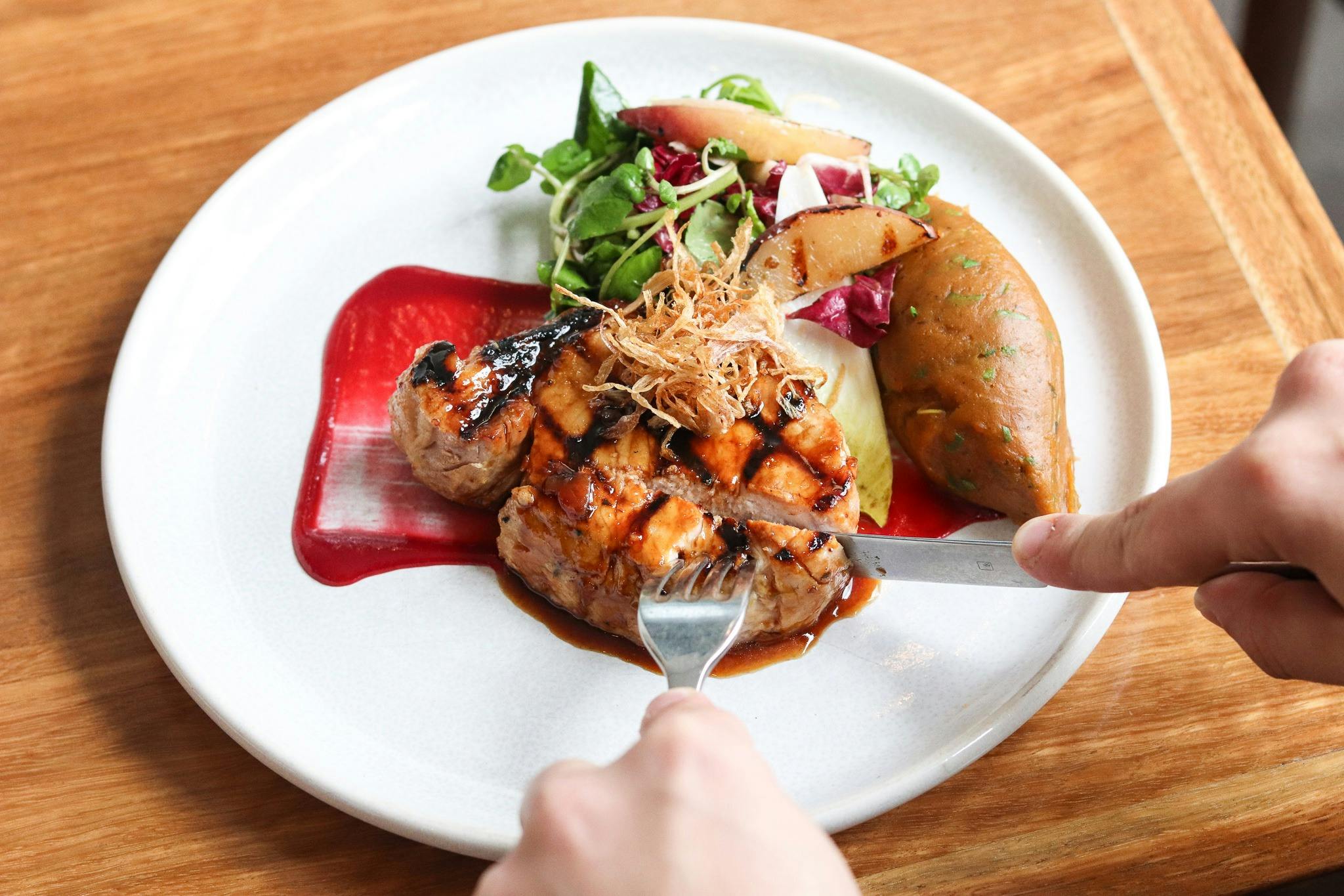 Pork loin with plum, peach, sweet potato