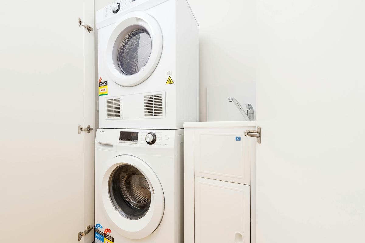 Laundry facilities available in corridor