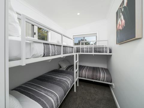 Second bedroom showing 2 sets of bunks