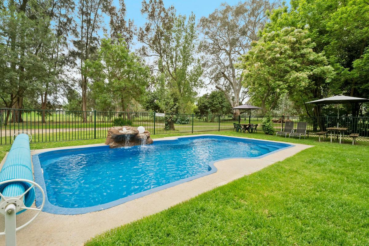 The pool invites you on a warm afternoon.  The sound of running water is relaxing year round.