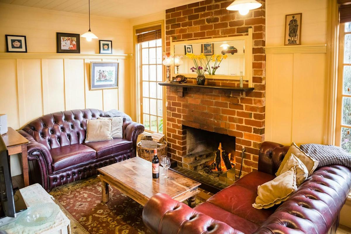 Lavender Cottage cozy living room with open fireplace
