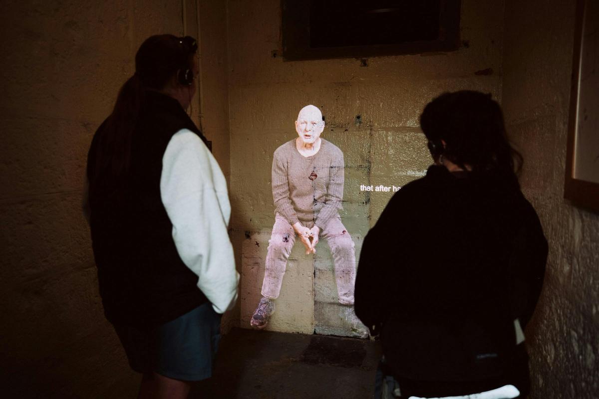 People looking at audio visual content