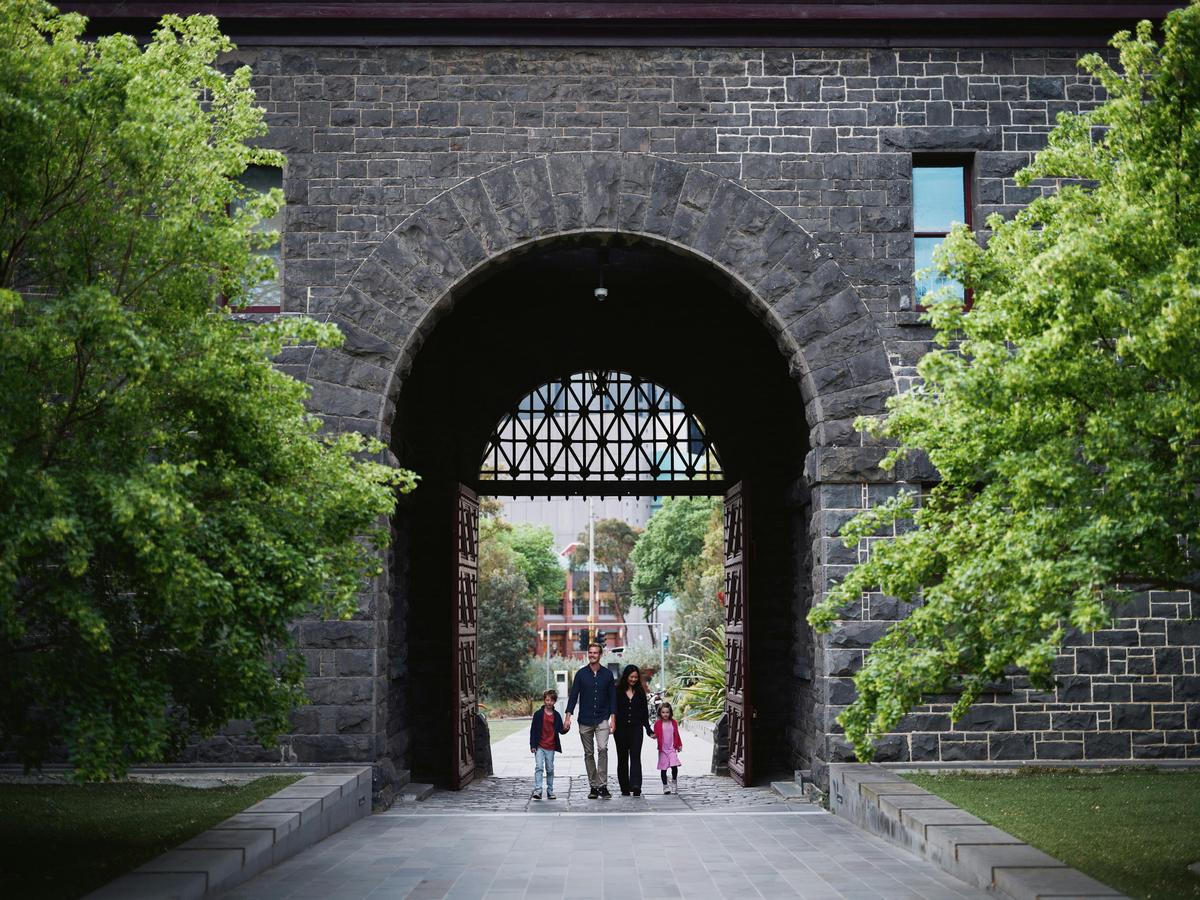 Family in the grounds of Old Melbourne Gaol