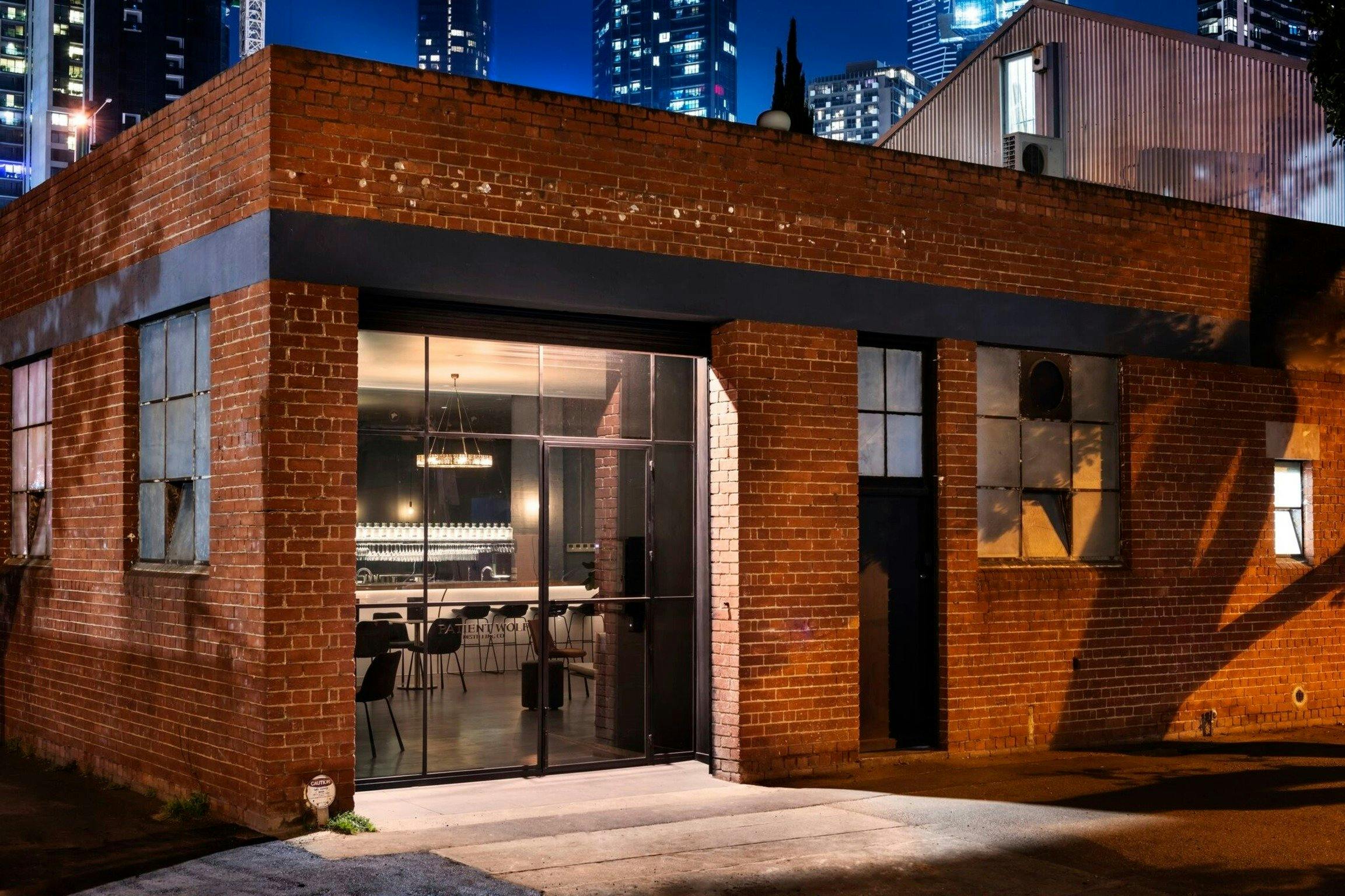 Patient Wolf Distilling Co. at night