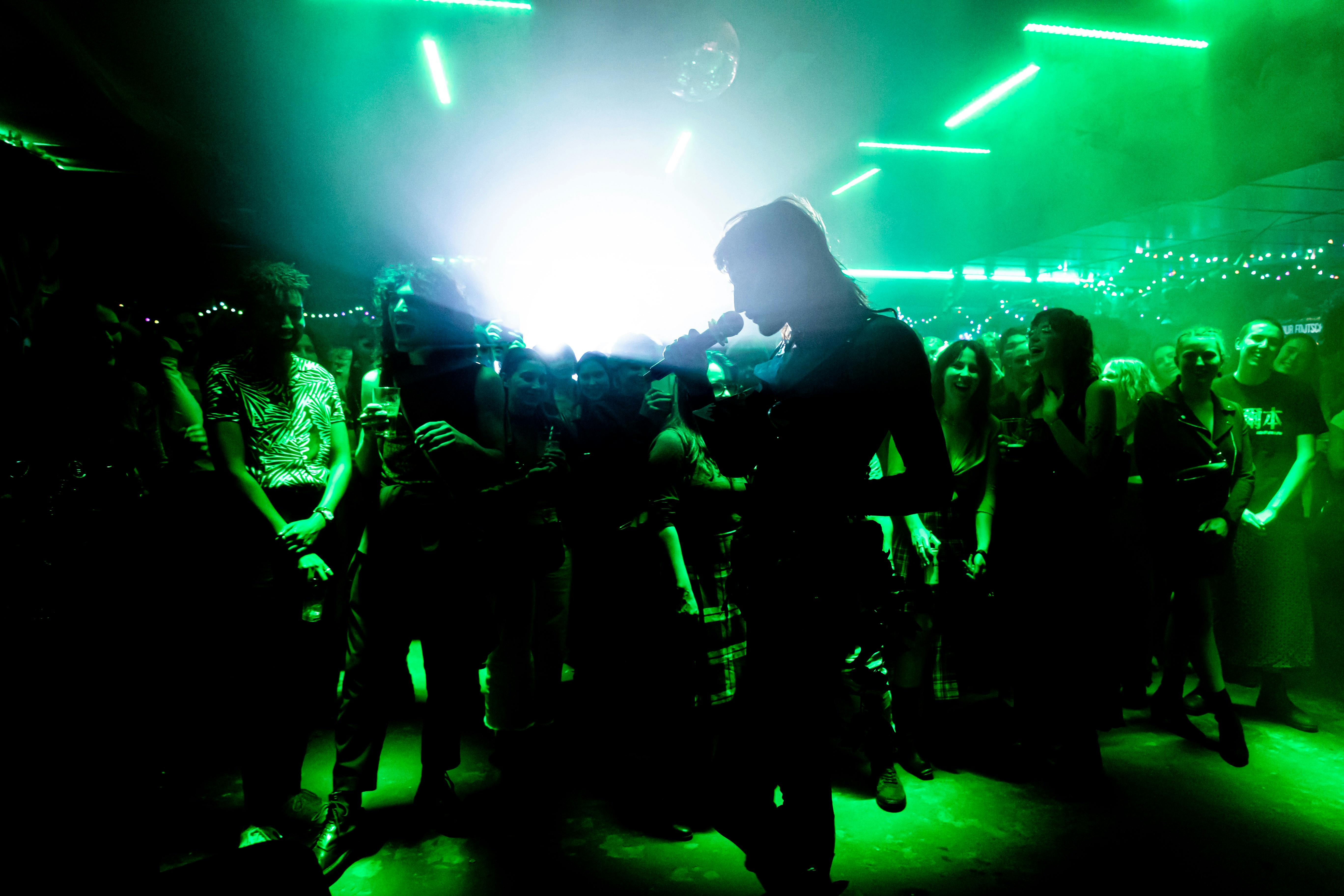 A singer entertains the crowd at Pride