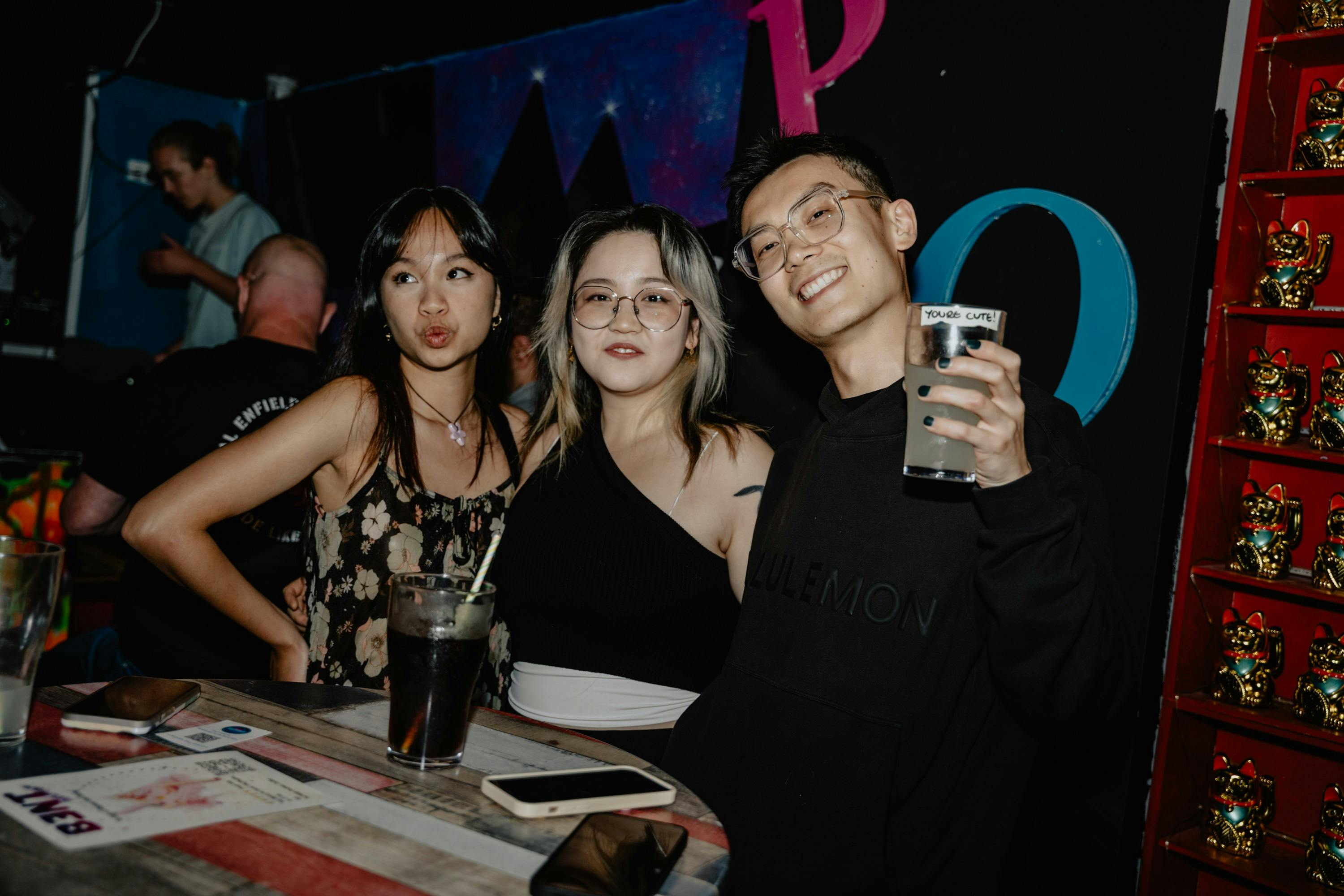 A group of friends enjoying their night at Pride