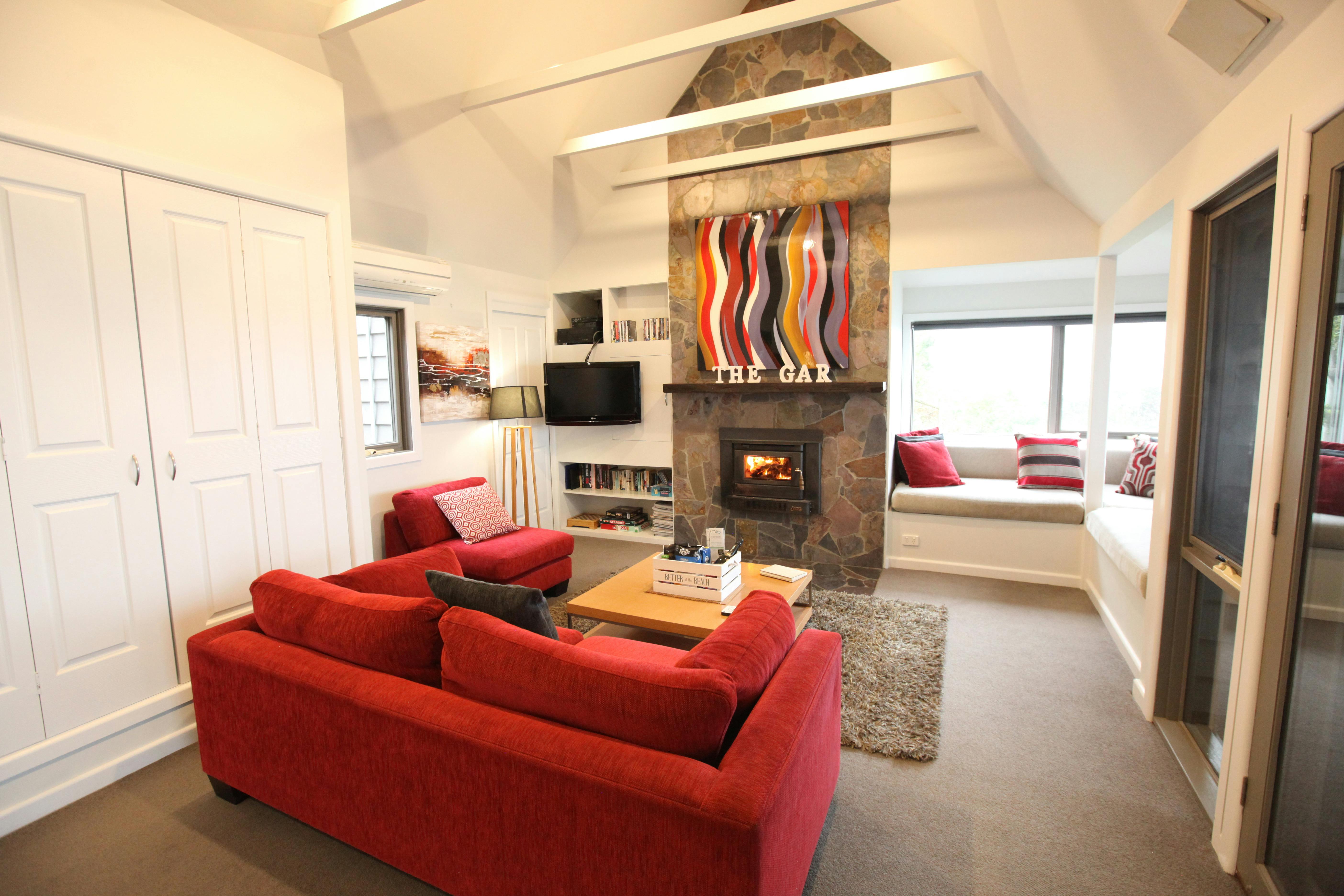 Cottage 1  with a comfy lounge and fire