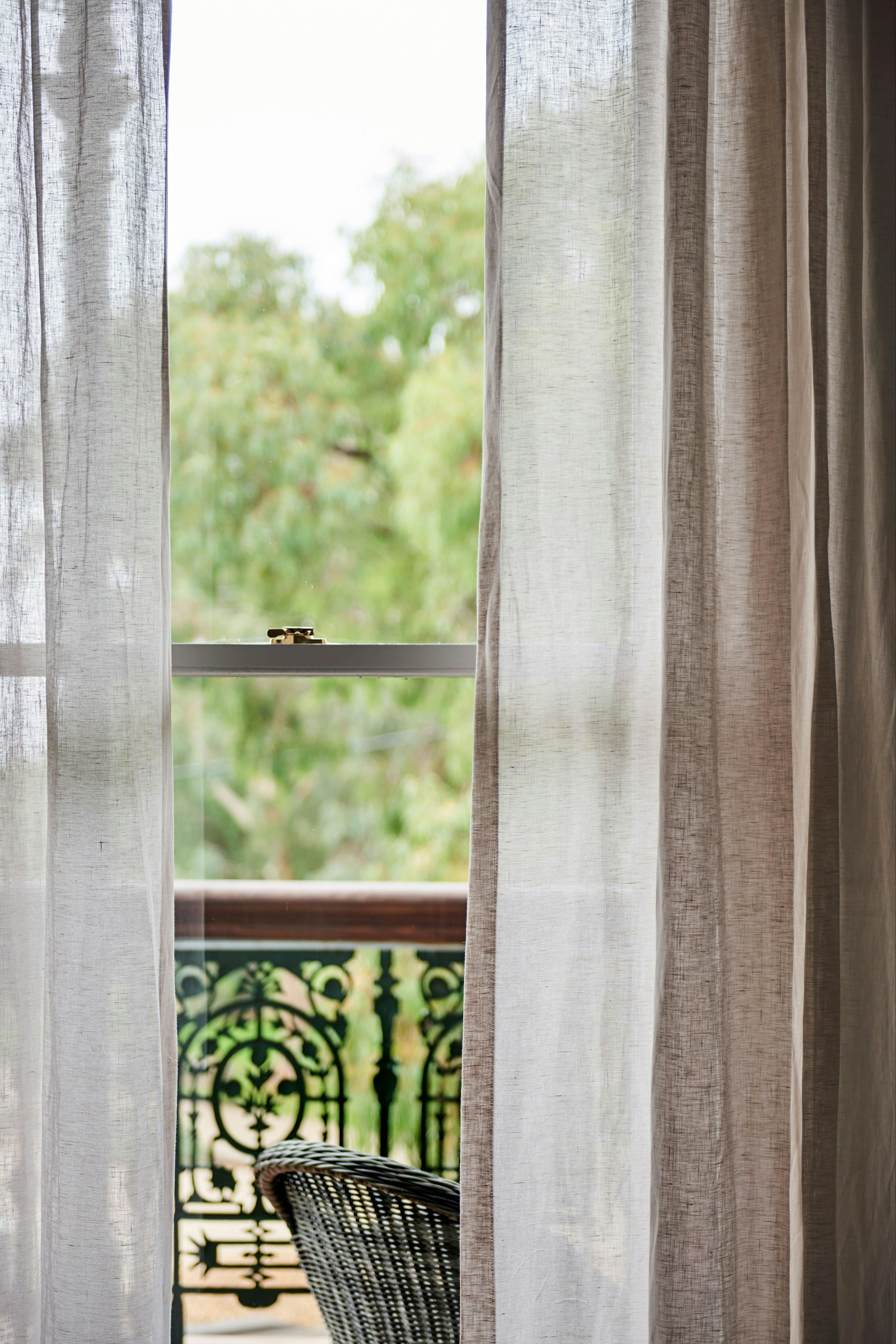 through the window looking onto the balcony