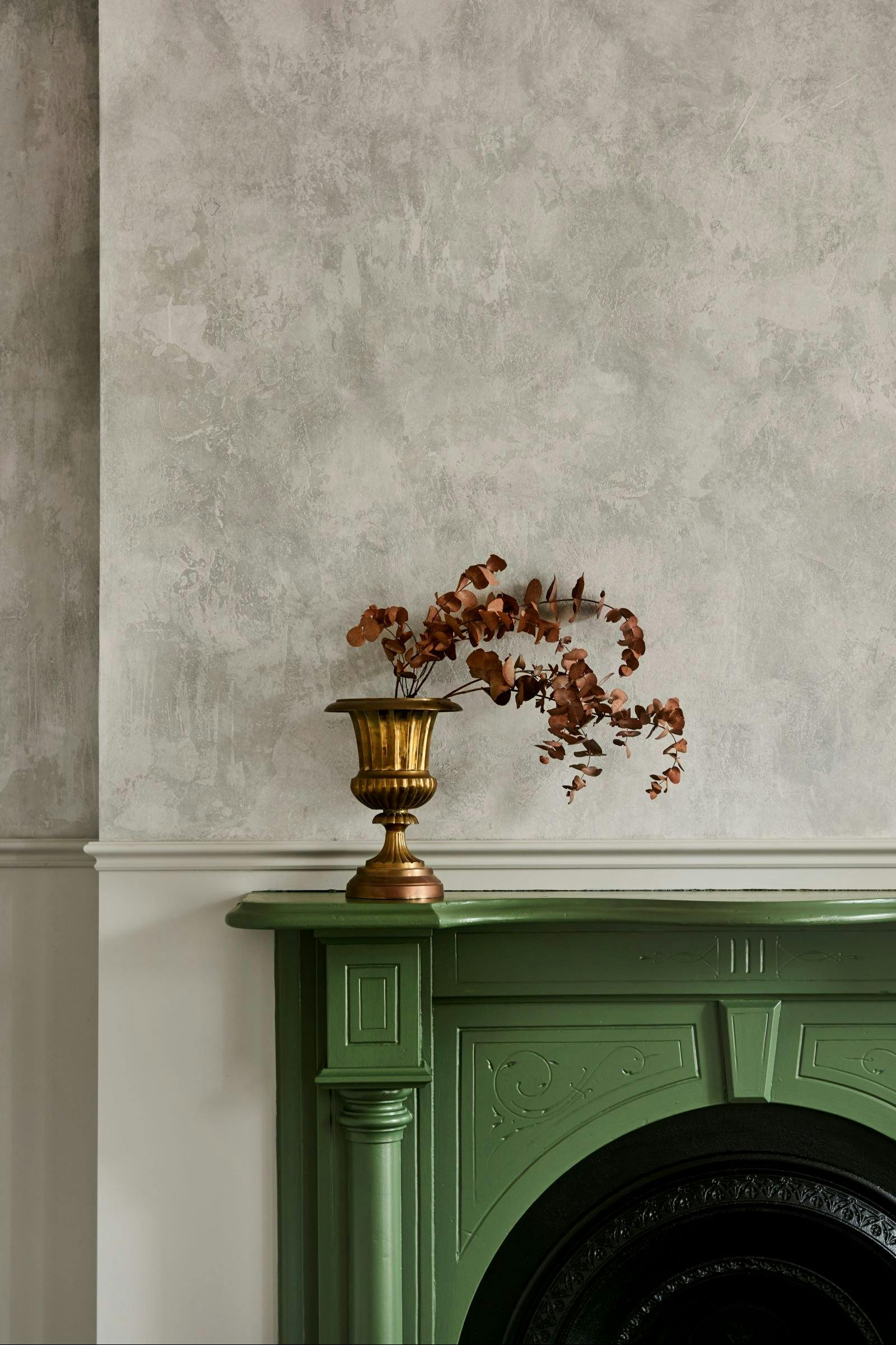 Fireplace with goblet with flowers