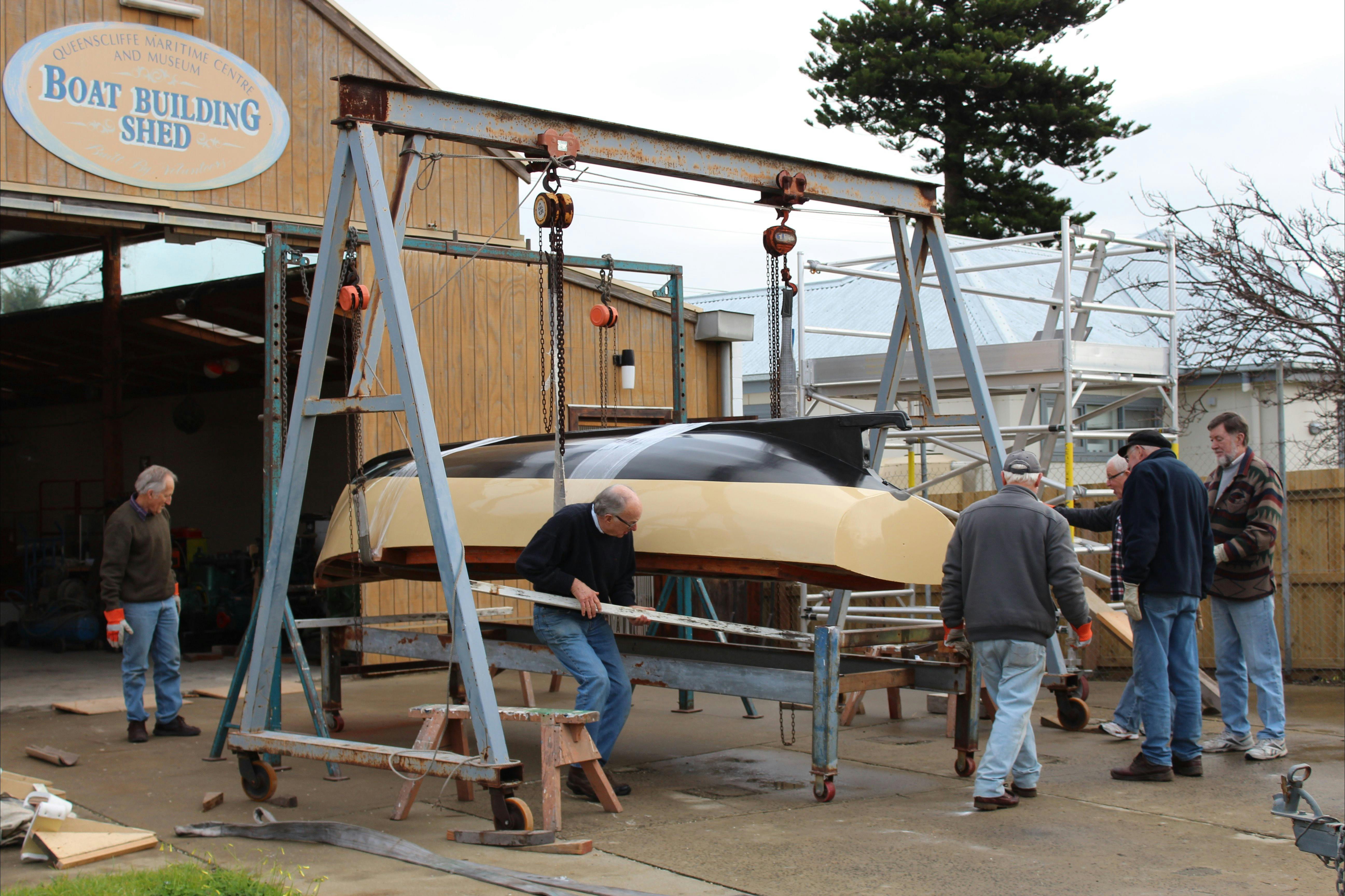 Volunteers in action at the Boat Building Shed