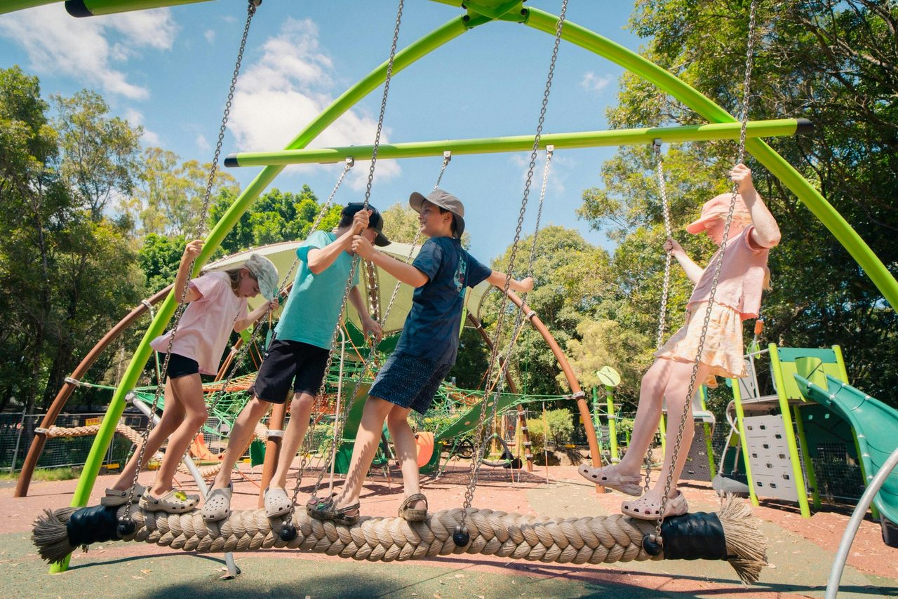 Kids swinging and having fun