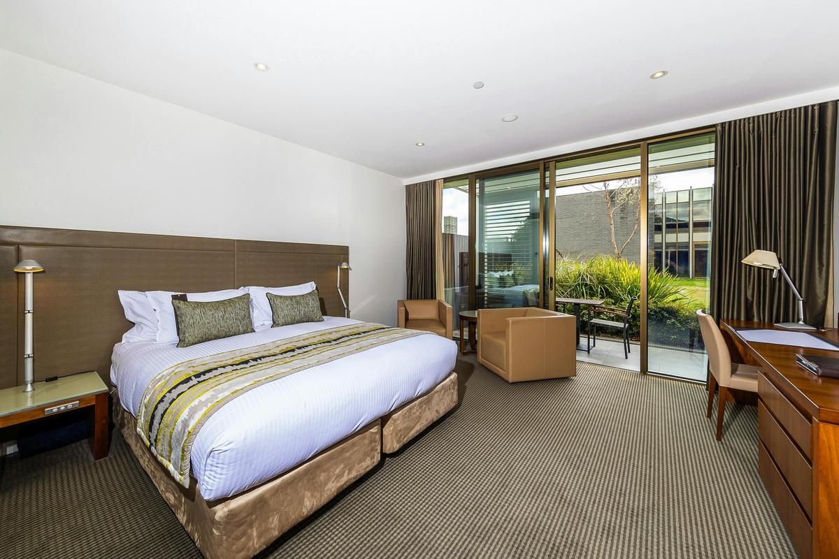 King bed, couch, desk and patio