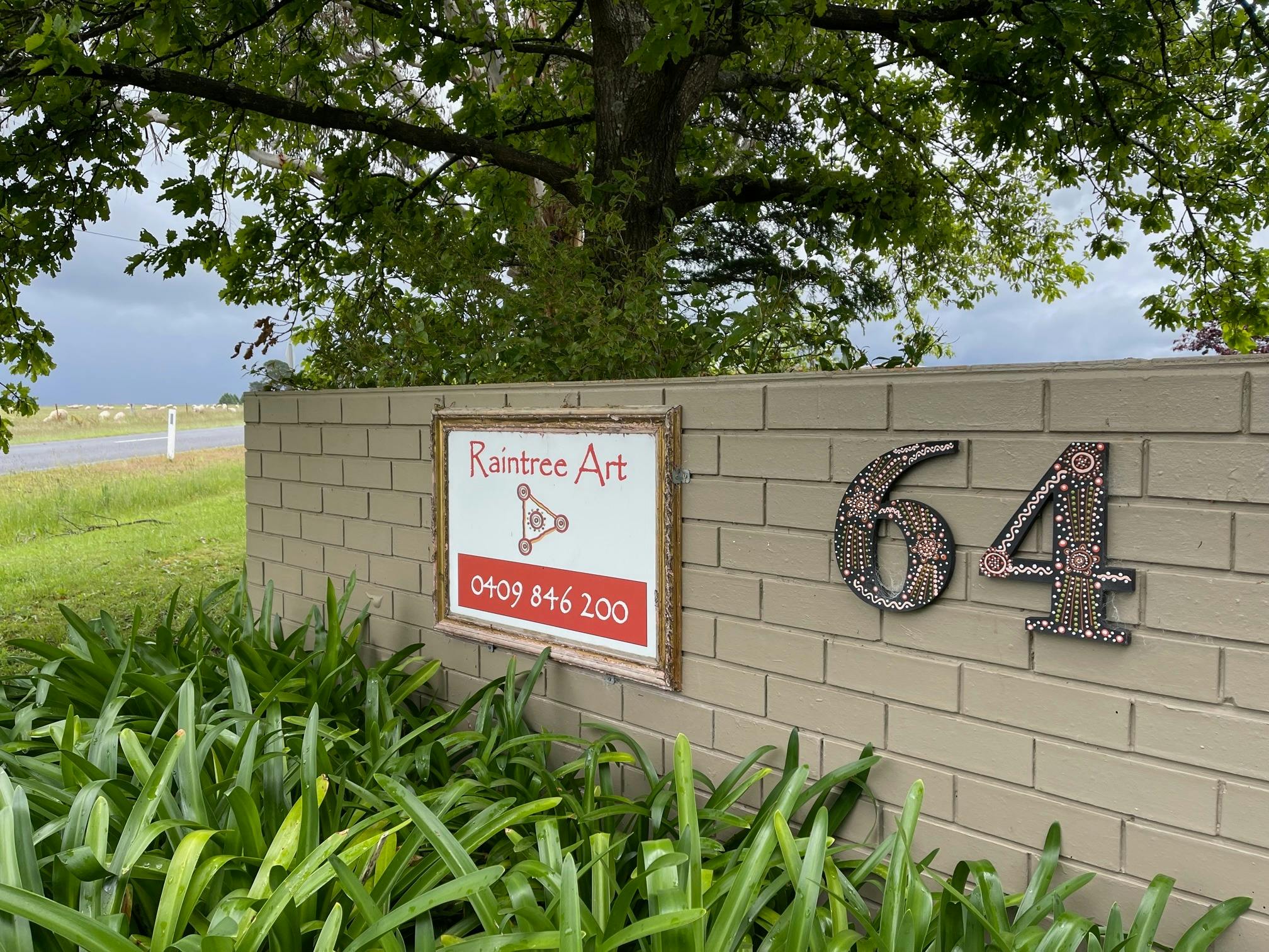 Raintree Art Sign