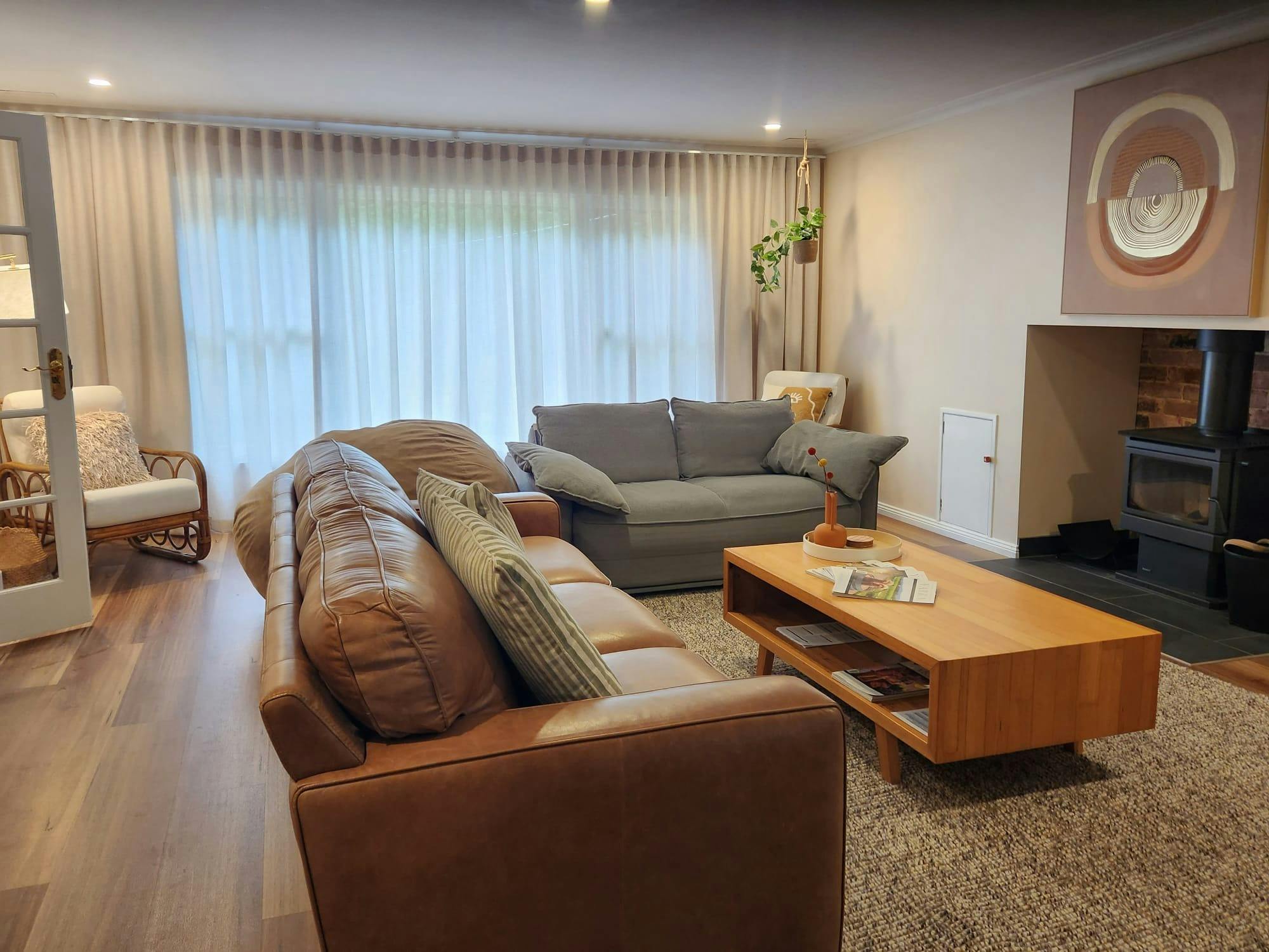 Lounge has seating for 6 and a wood-burning fireplace