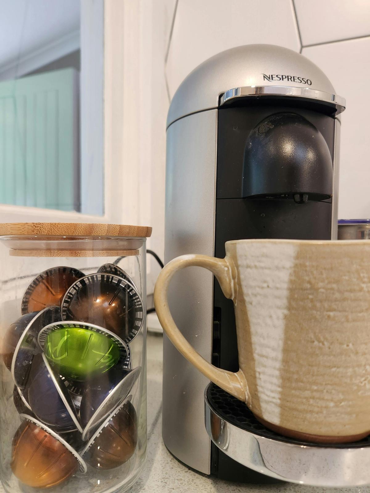 Coffee machine and pods are provided