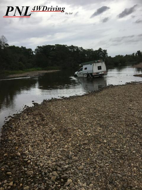 4WD attempting river crossing