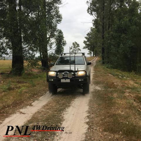 4WD proceeding down track