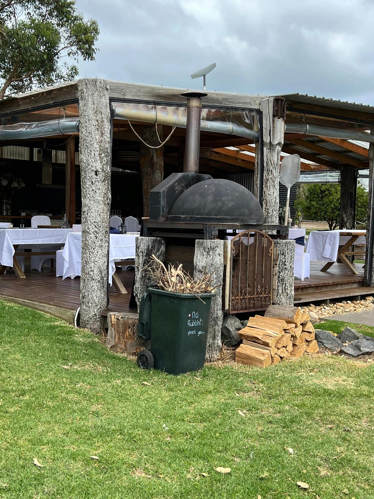 Enjoy outdoor kitchen and dining