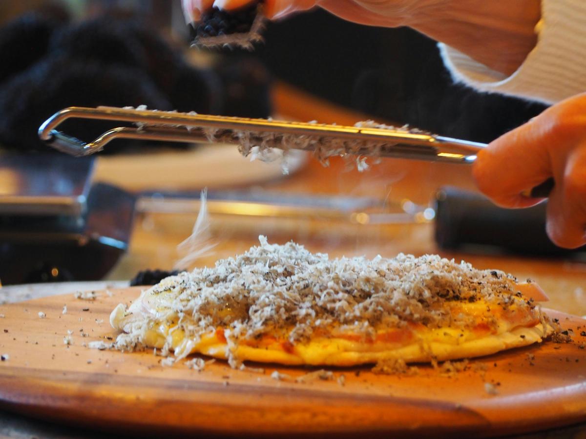 Grate on pizza