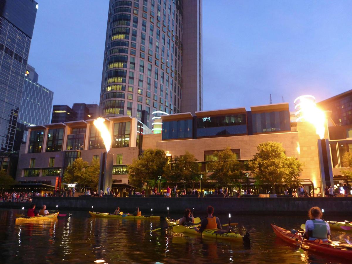 Flames from Crown Casino on Melbourne City Twilight Kayak Tour