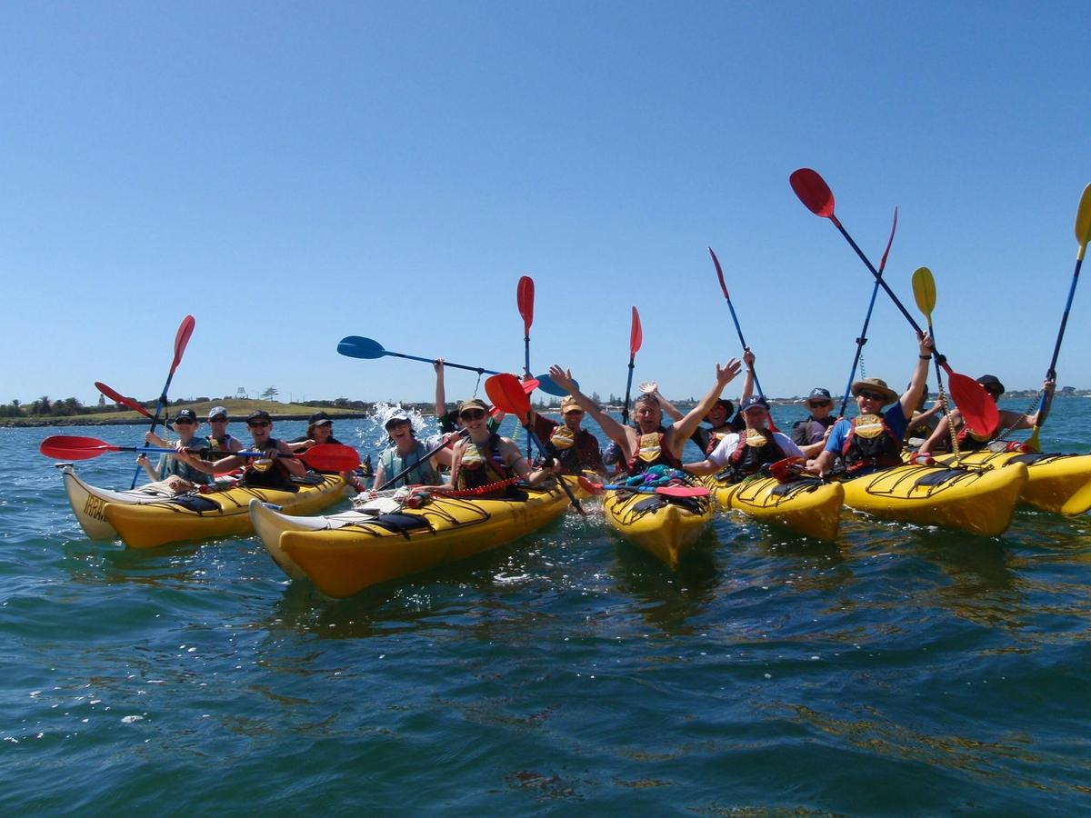 Group photo on a St Kilda Sea Kayak Tour