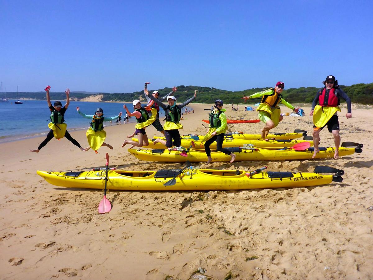 Jumping for joy at the start on a Phillip island Sea Kayak Tour
