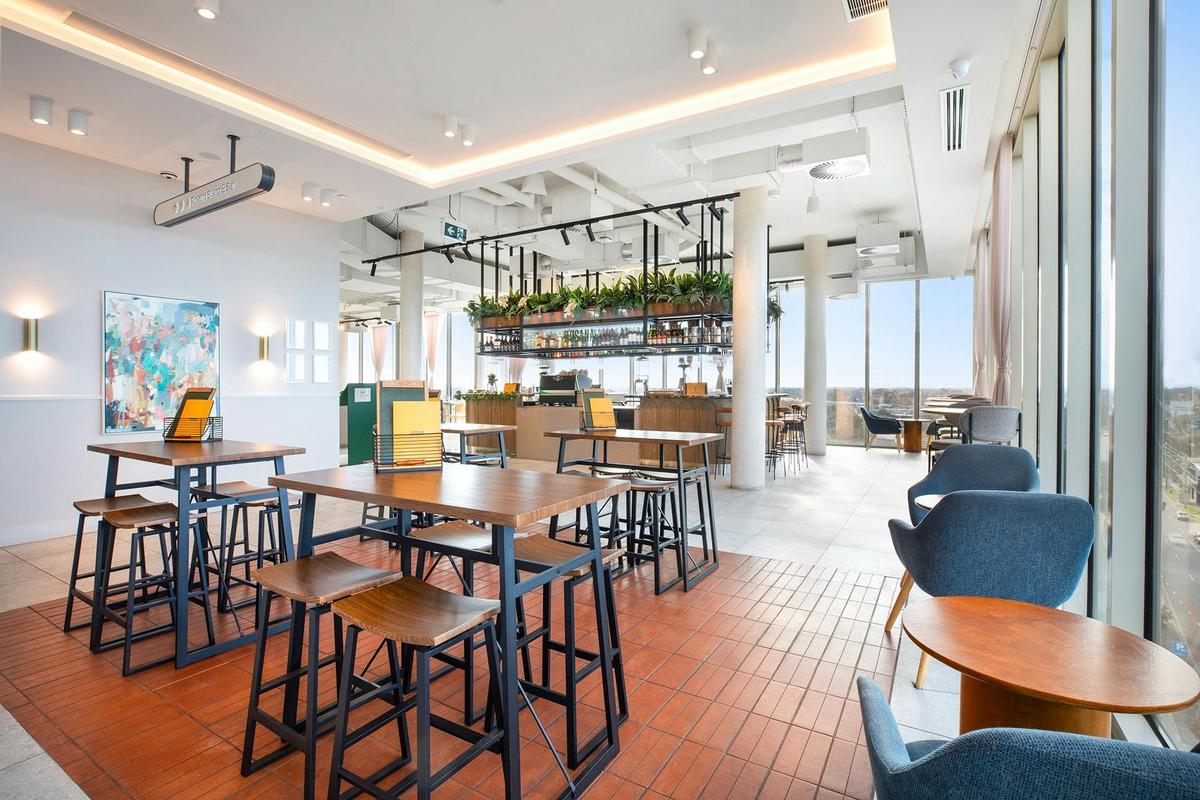 Sit at watch the day at our bar
