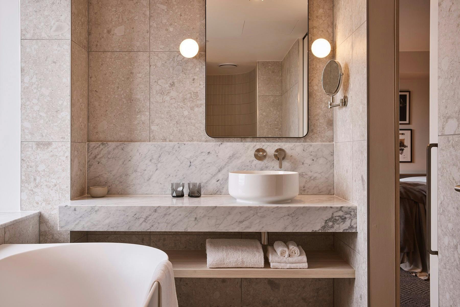 Deluxe Corner King Bathroom with deep soaker bathtub