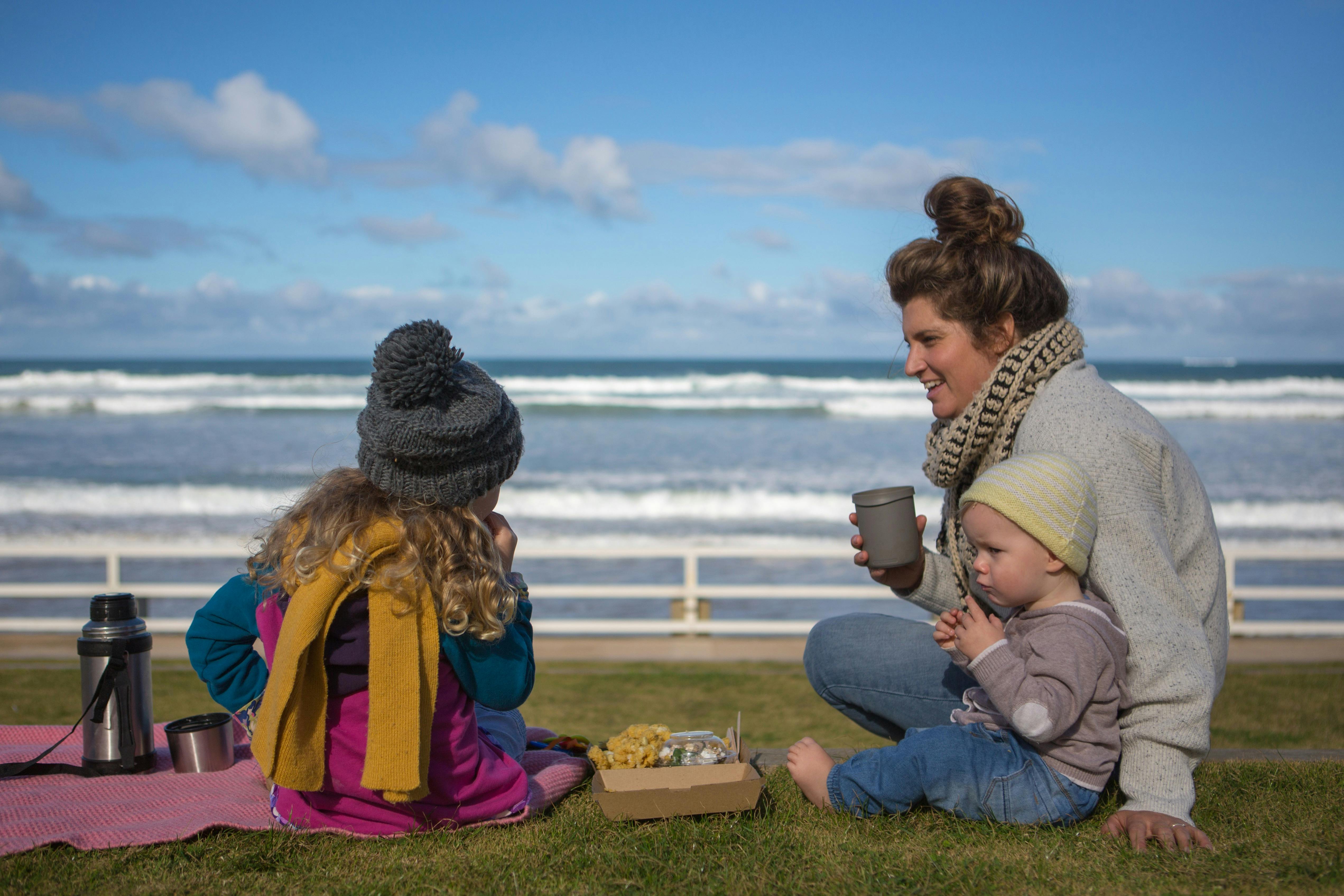 Enjoying a beach picnic at Ocean Grove Main Beach in the cooler months