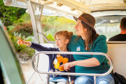 Mother and daughter on open air bus