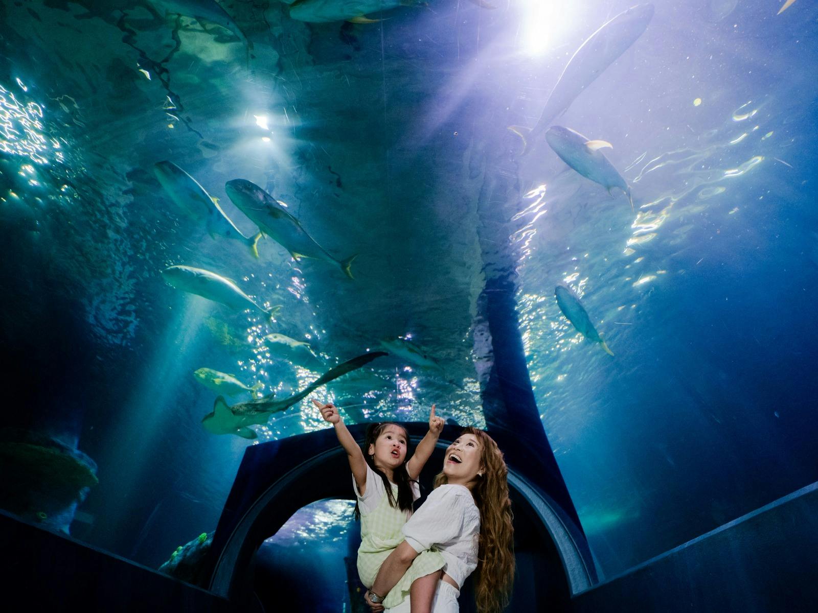 mum holding her daughter.